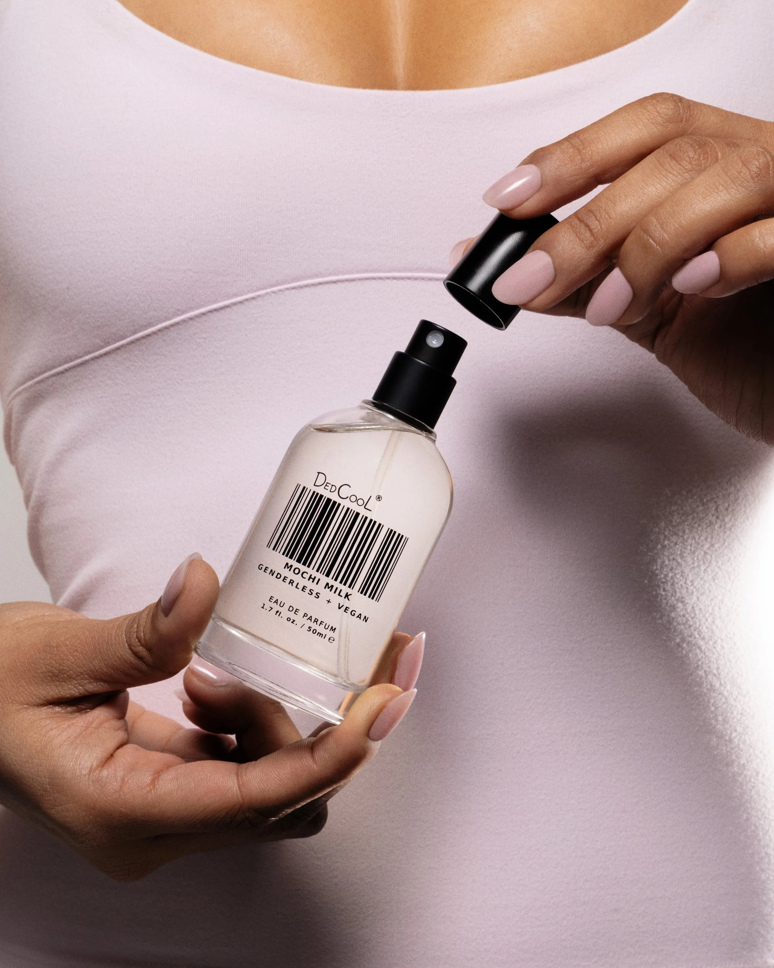 08_ModelPlaysWithBottle_302-CROPPED.jpg