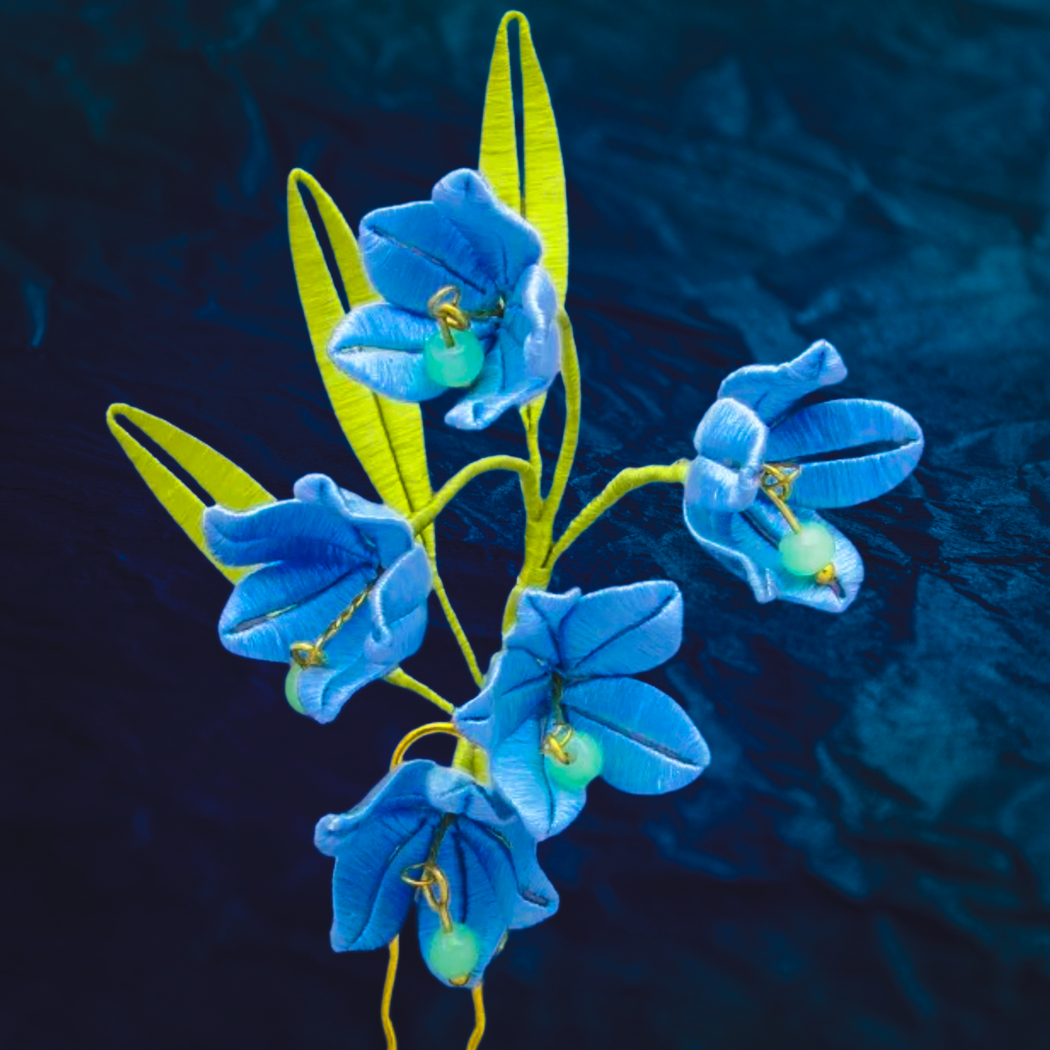 Colorized microscopic image of a blue virus particle with yellow and green spike proteins protruding from its surface.