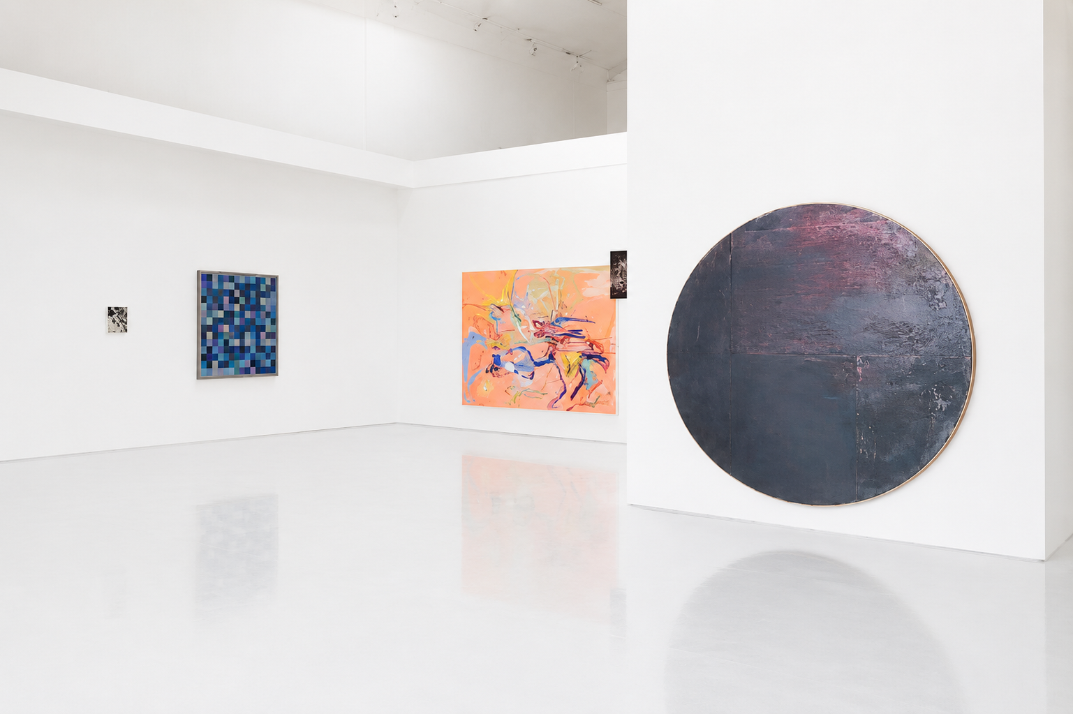 Art gallery with white walls and abstract paintings, including a pixelated blue artwork, a colorful abstract piece, and a large dark circular painting.