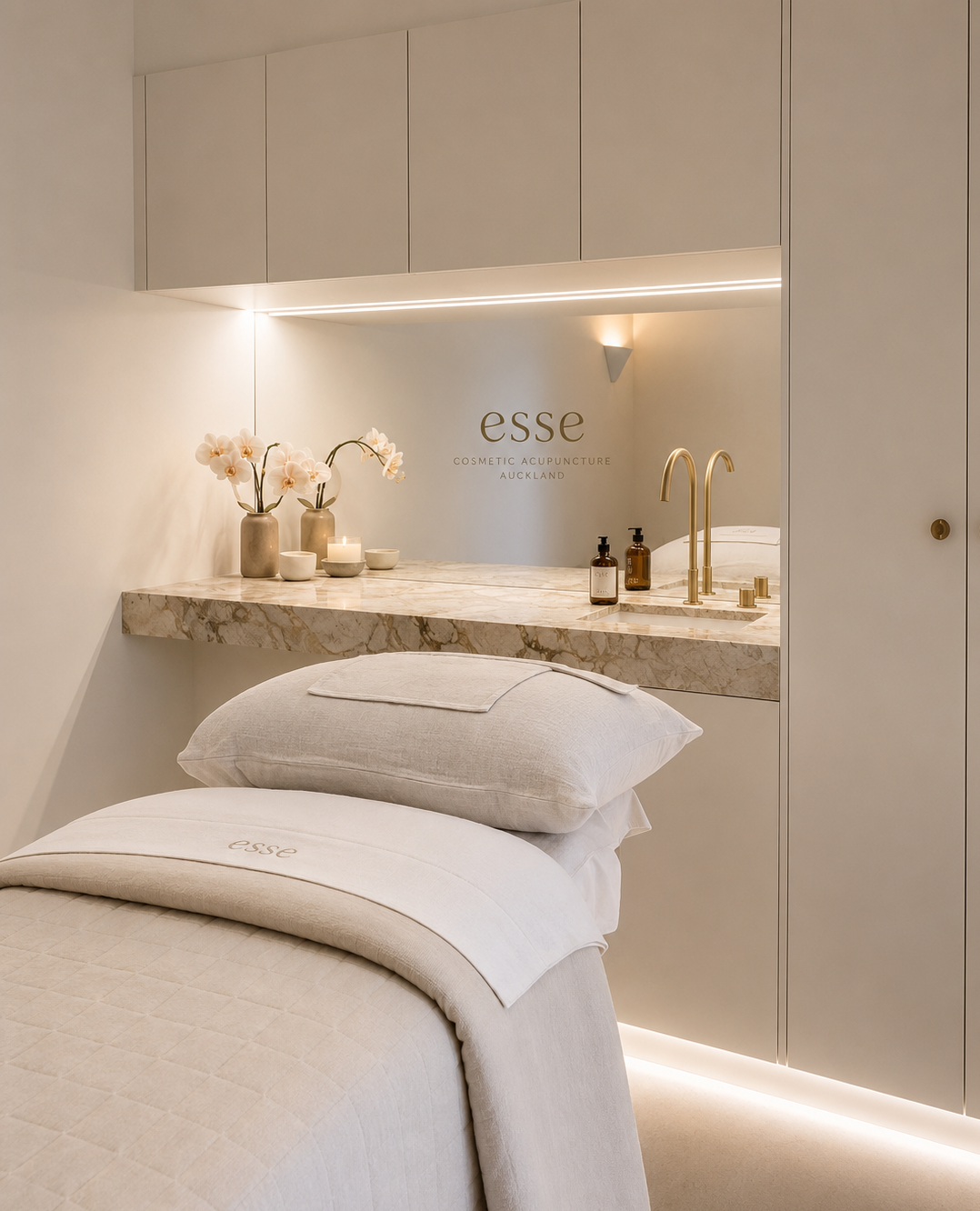 Calm, softly lit treatment room creating a relaxing wellness atmosphere
