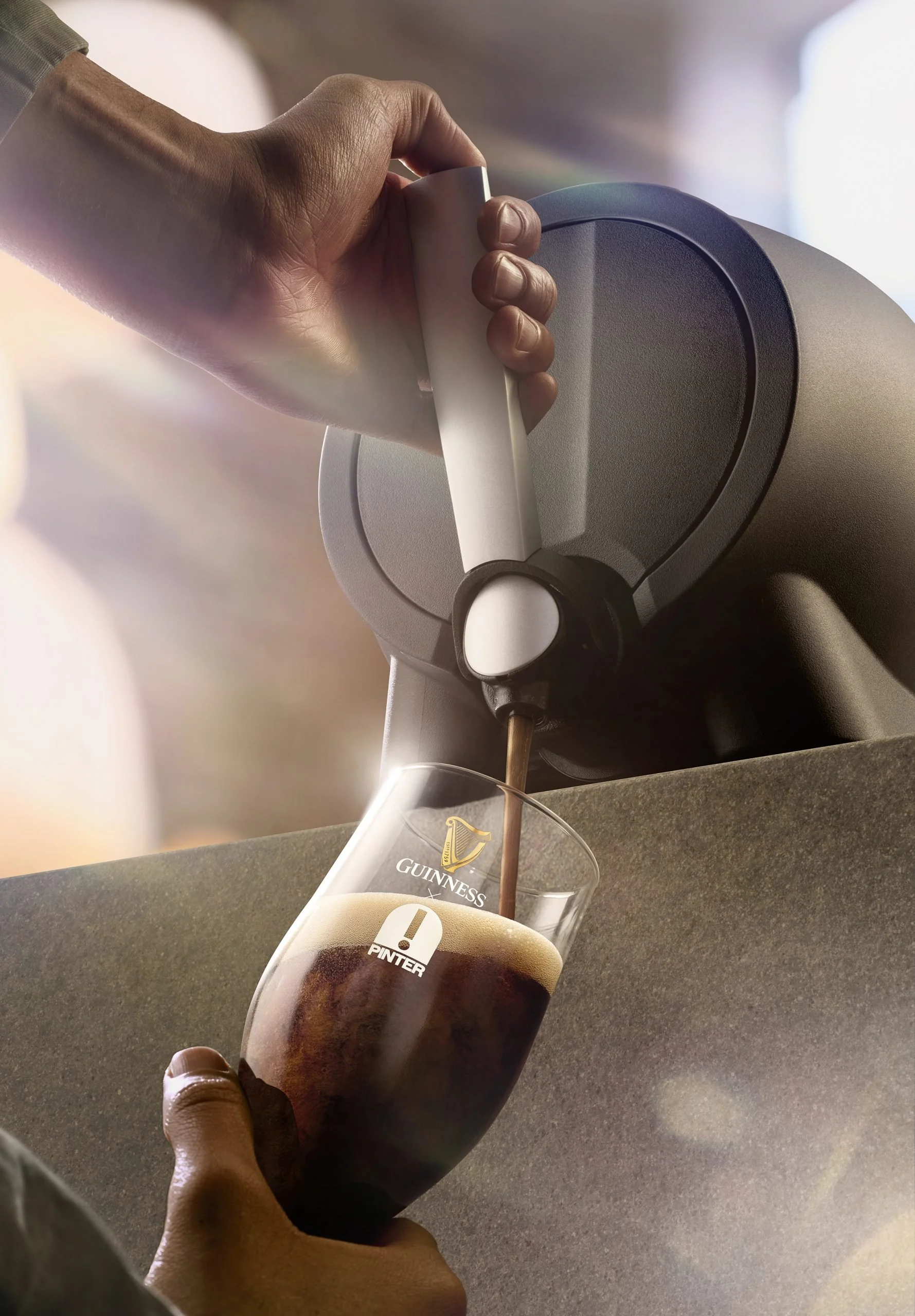 A person is pouring Guinness beer from a tap into a glass with Guinness branding, in front of a beer dispenser.