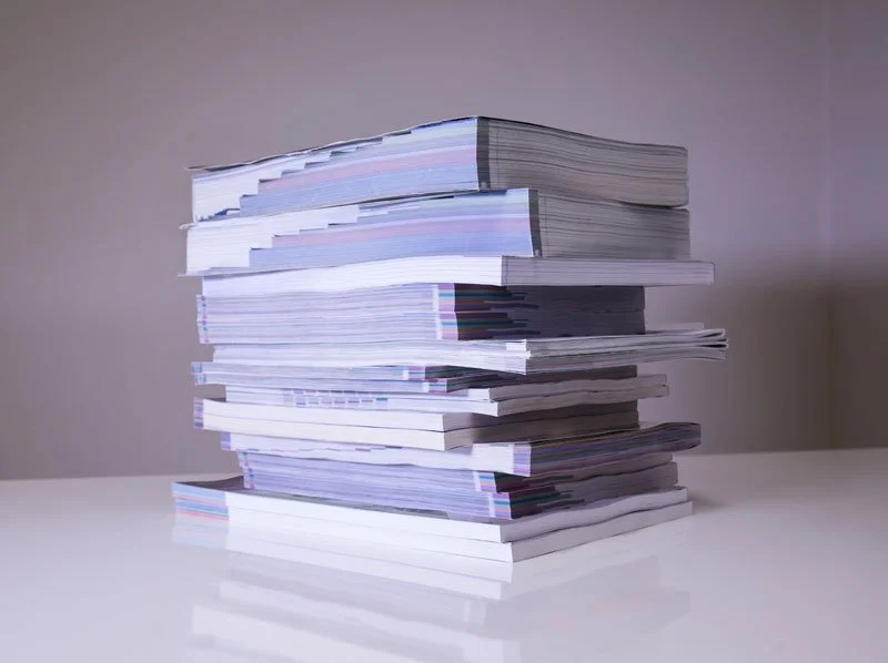 A tower of printed catalogues