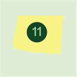 Nummer 11 på en gul bakgrunn