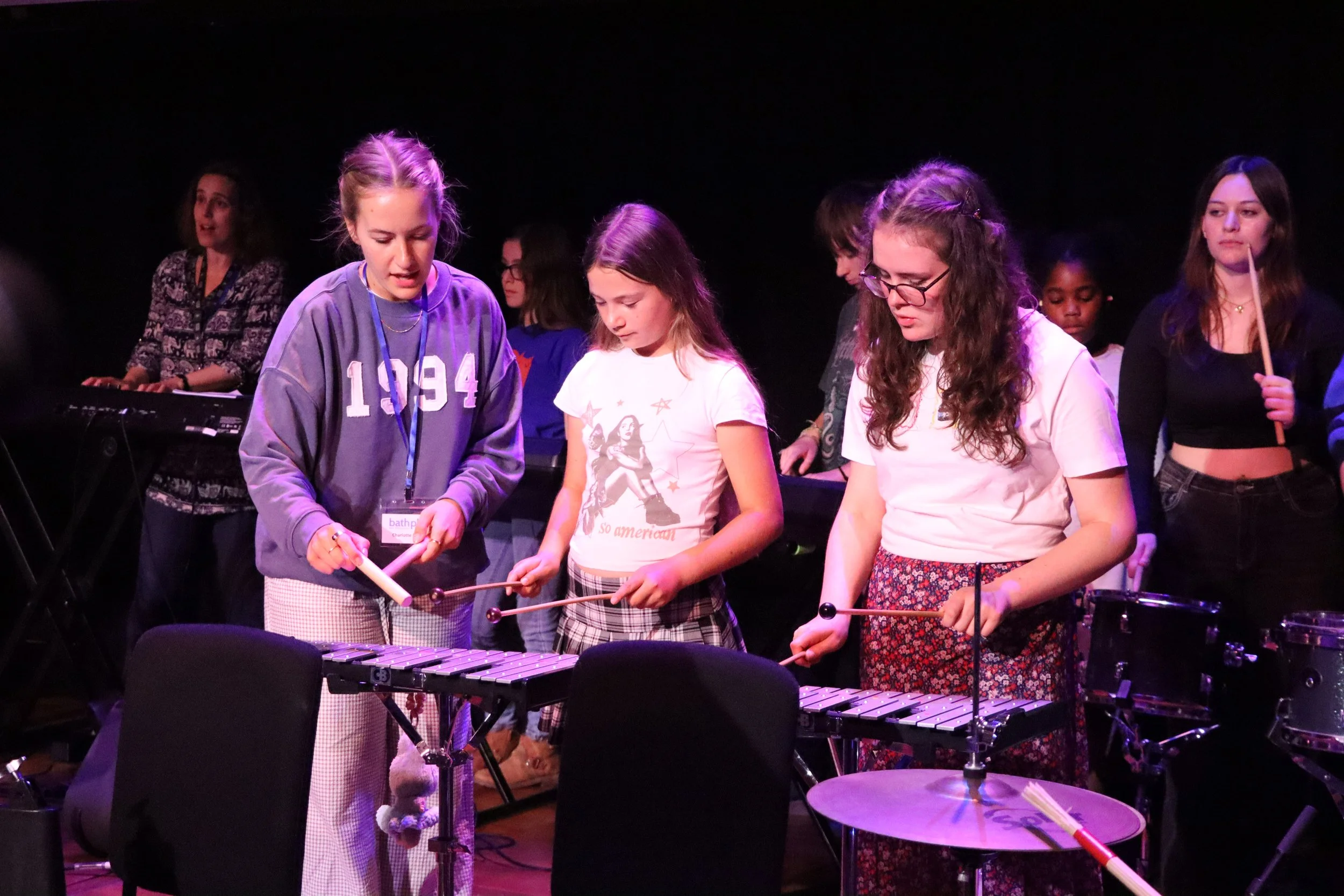Music Leader from Bath Philharmonic Orchestra teaching glockenspiel to Bristol Young Carers.