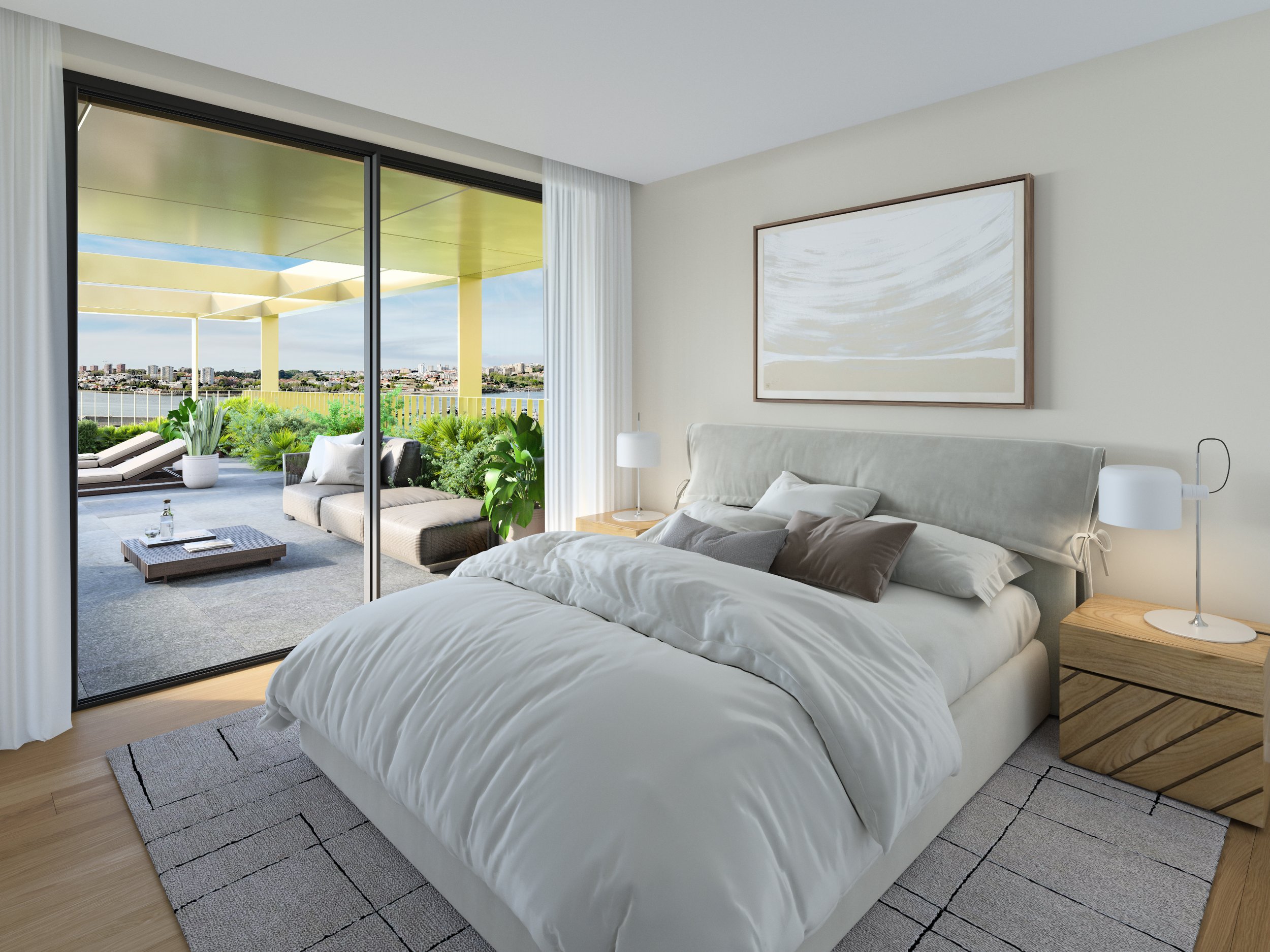 A bedroom with a large bed covered in white bedding, a nightstand with a lamp, and a framed abstract art piece on the wall. Sliding glass doors lead to a patio with outdoor furniture and plants, overlooking a cityscape and water beyond.