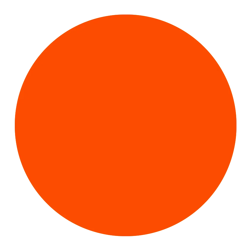 The image contains a large, pixelated orange circle with some red and pink elements to the right side.