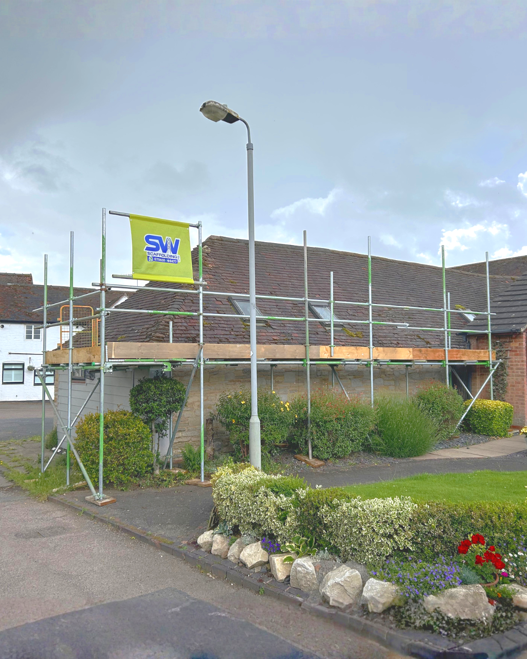 House with scaffolding set up around the front, indicating renovation work.  Scaffolding service for homes from SW Scaffolding