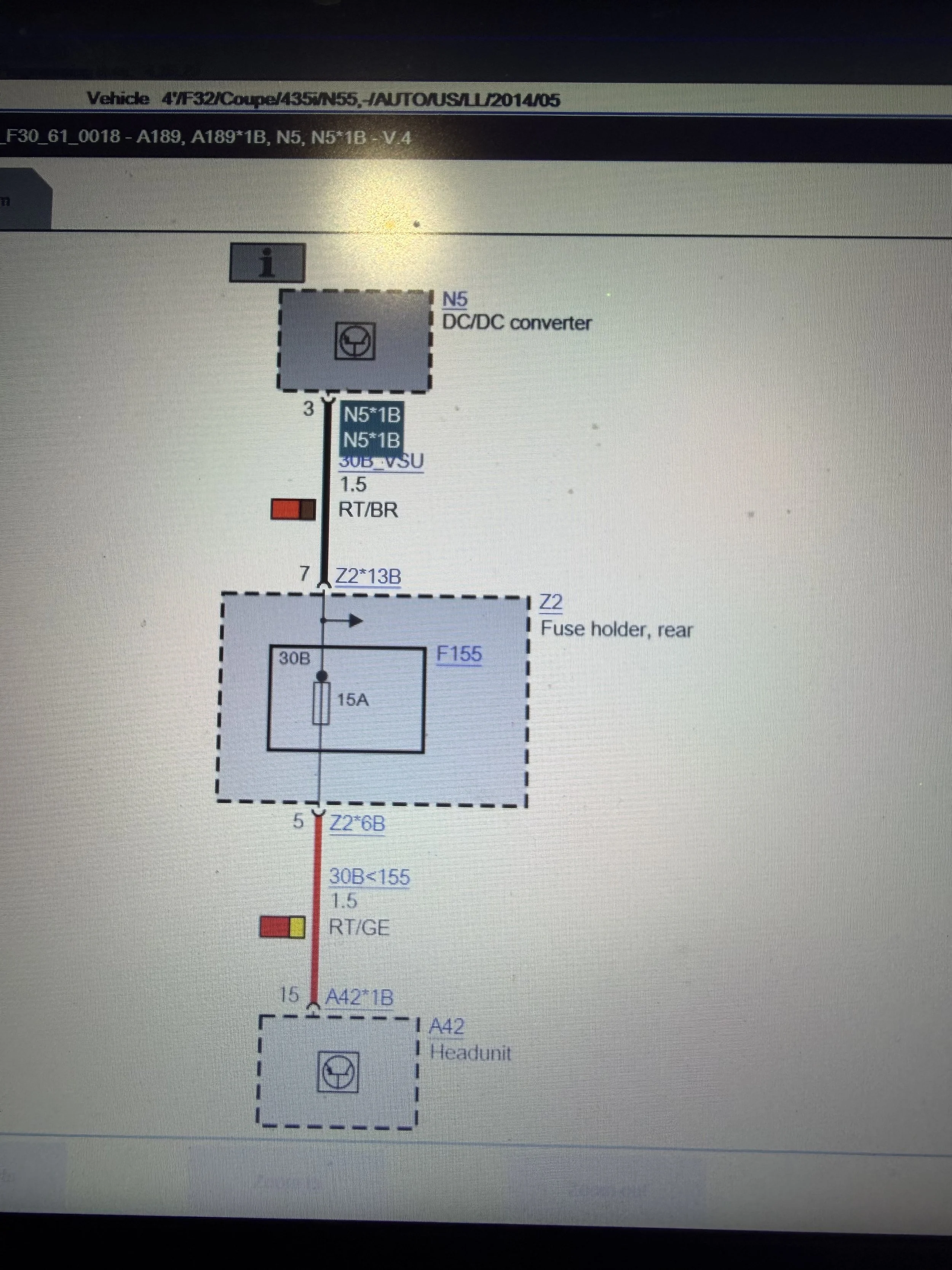 A wiring diagram showing a vehicle schematic with various electrical connections, components, and labels including fuse holders, converters, and wires.