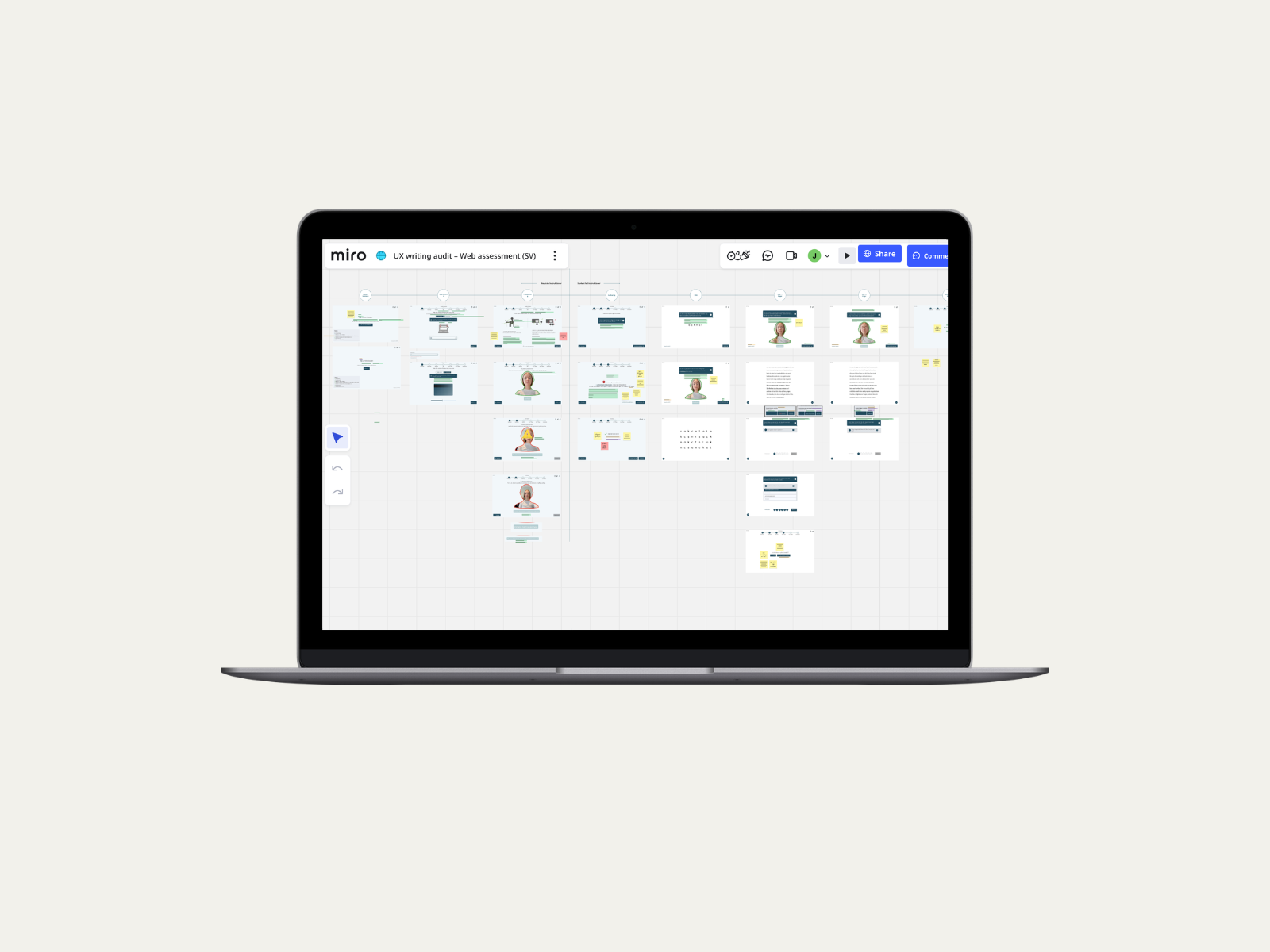 Laptop displaying a detailed digital project plan or presentation with multiple slides or screens visible.
