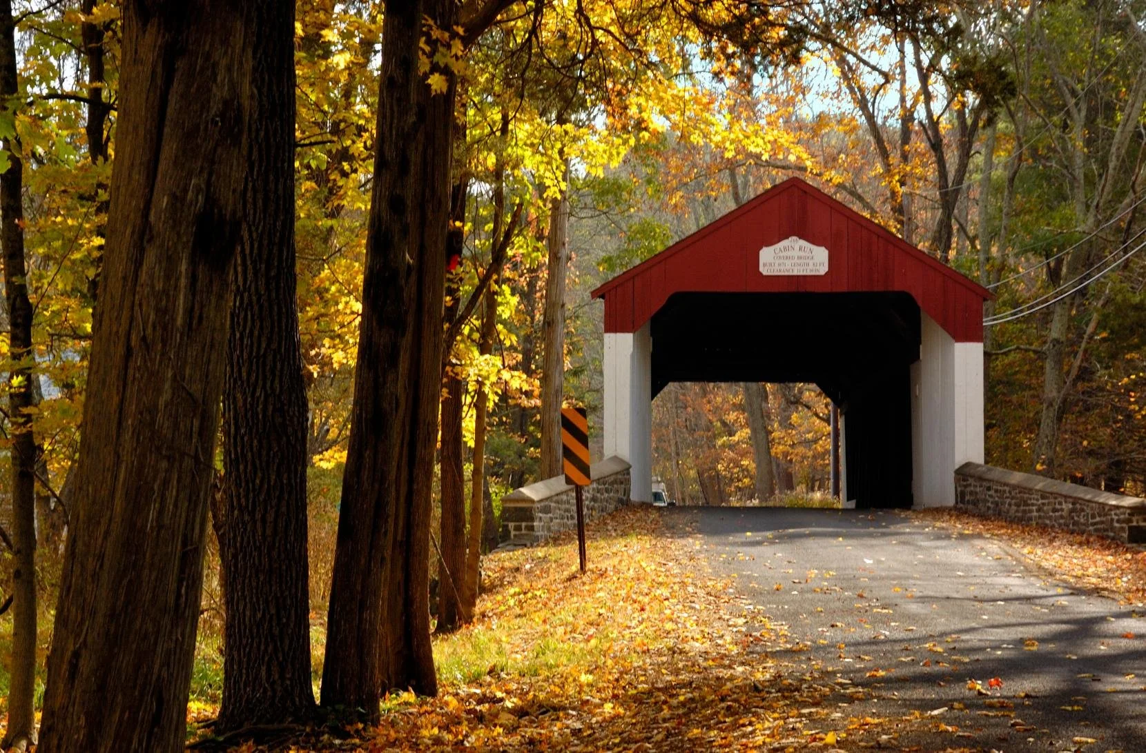 Historic Cabin Run Covered Bridge in Plumstead Township, Bucks County PA, one of the many landmarks that define the character and community of Central Bucks County, served by residential real estate advisor Jeff Linden of RE/MAX Services.