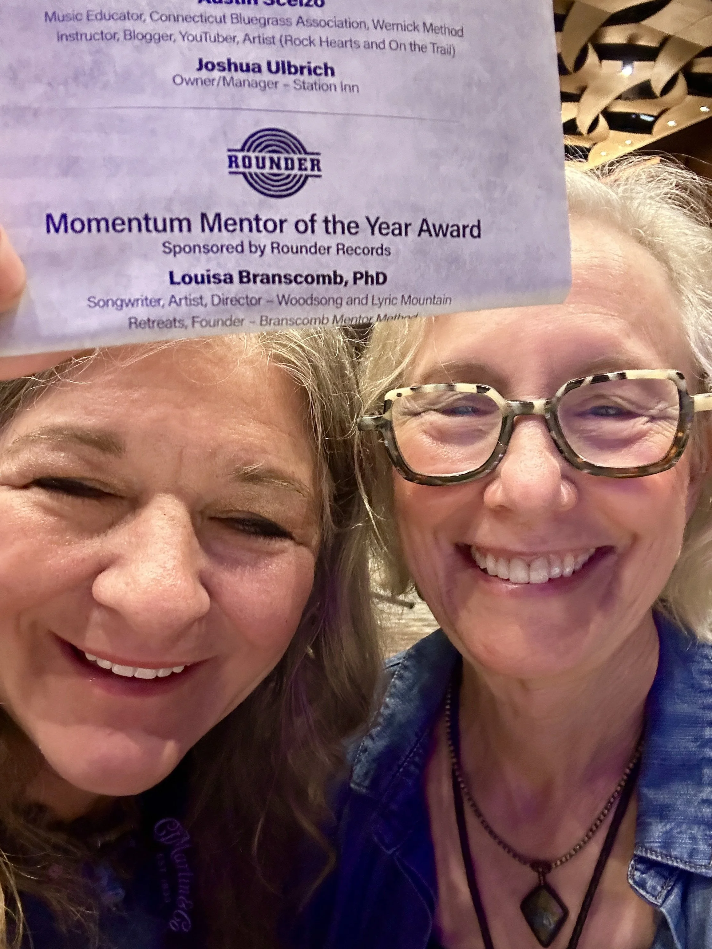 Valerie Smith congratulates Louisa on her 4th Mentor of the Year Nomination.jpg