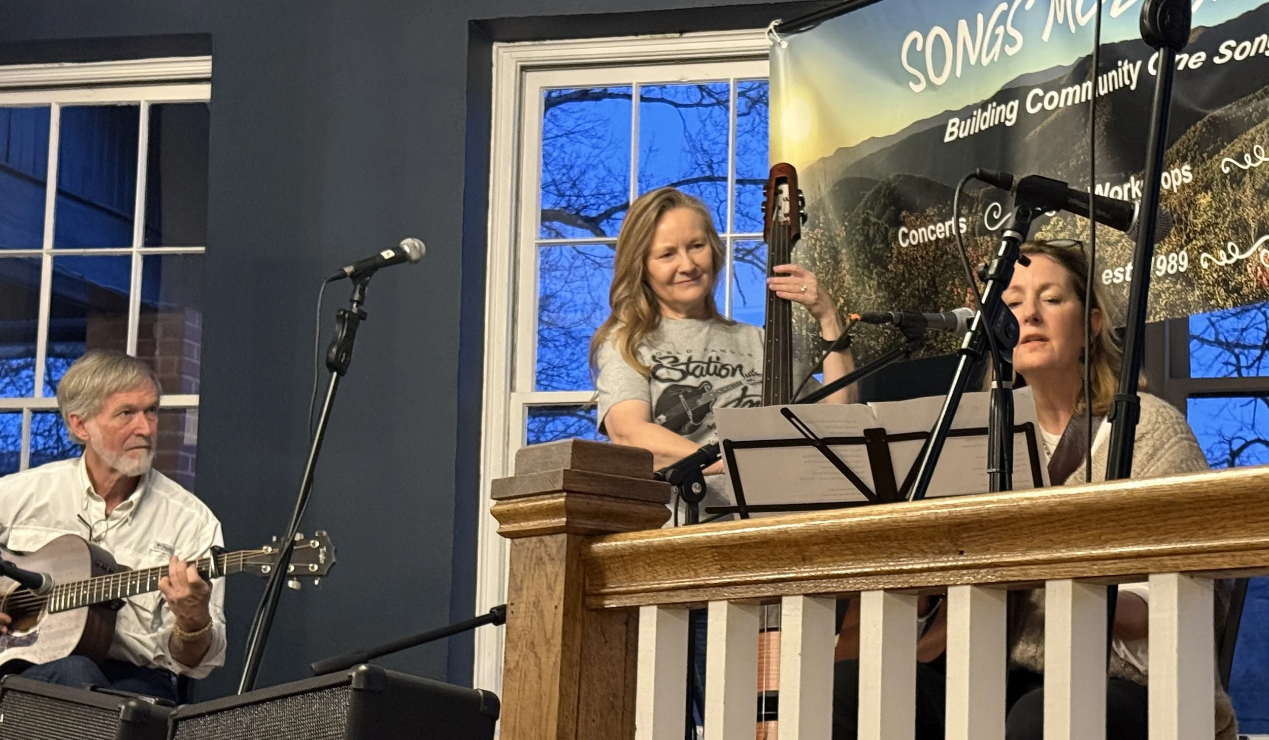 Instructor Jeanette Williams backs up performing songwriters.JPG
