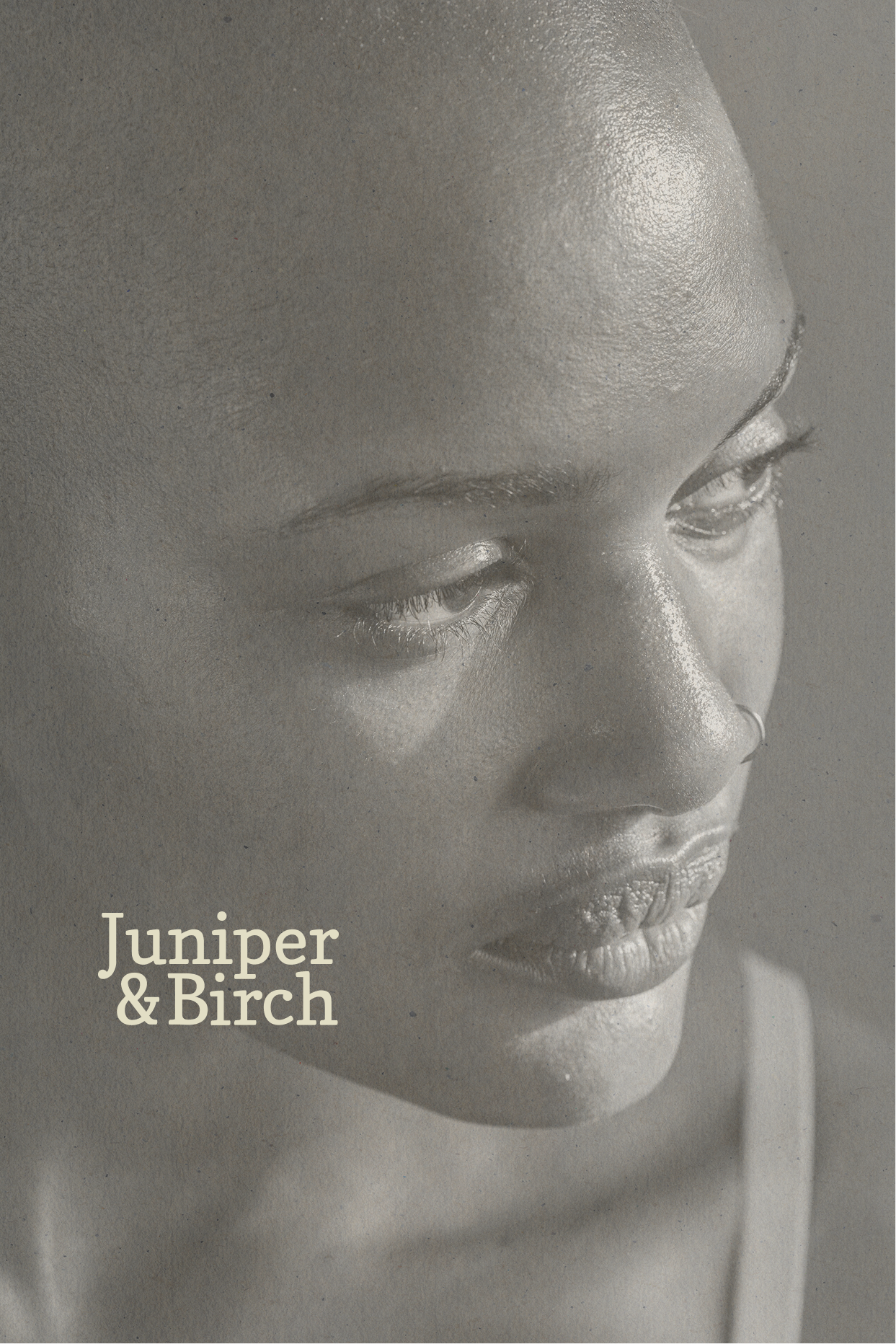 Close-up of a mannequin's face in profile, with emphasis on the nose and lips, in black and white. Text on the image reads "Juniper & Birch".