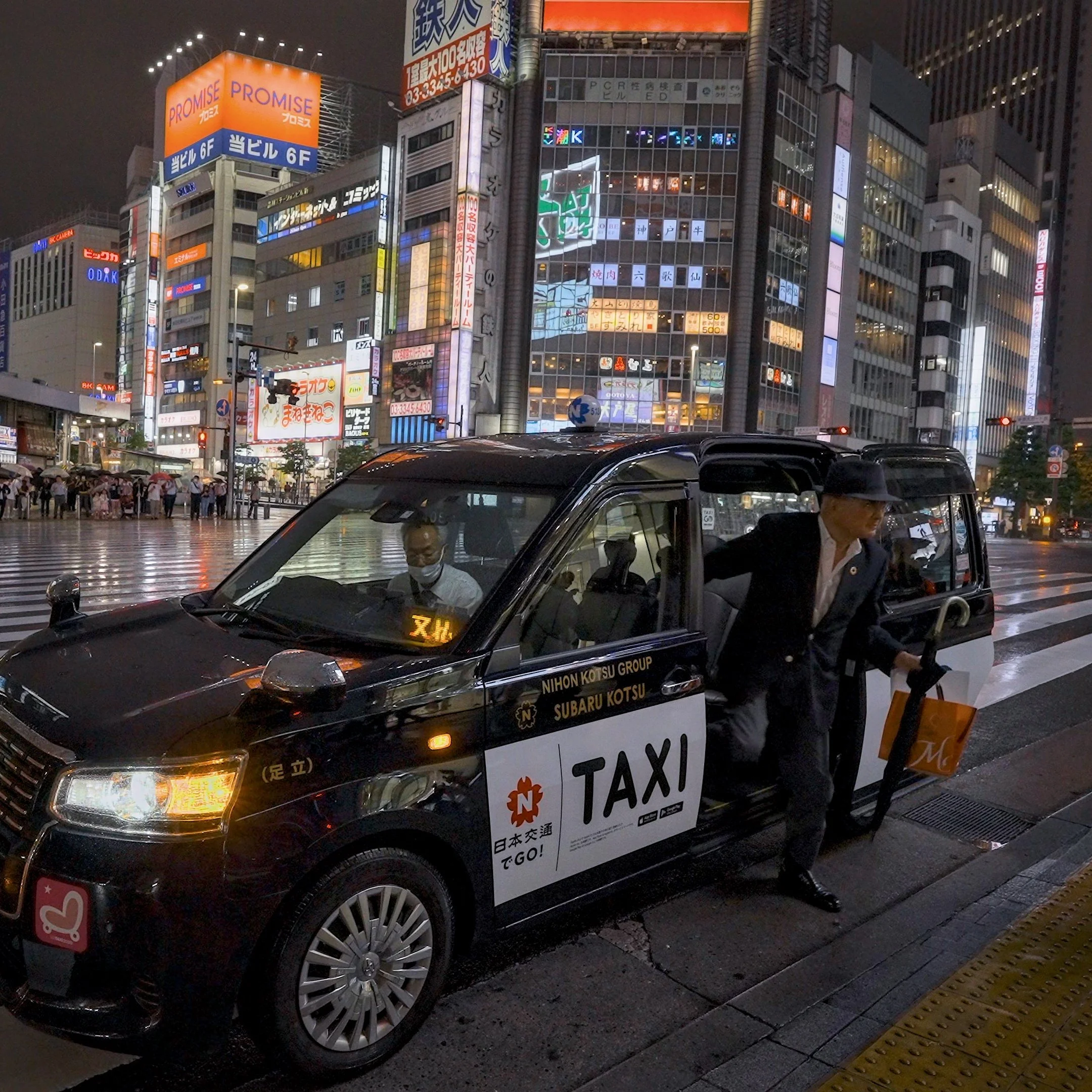 Man getting out of Taxi in Japan