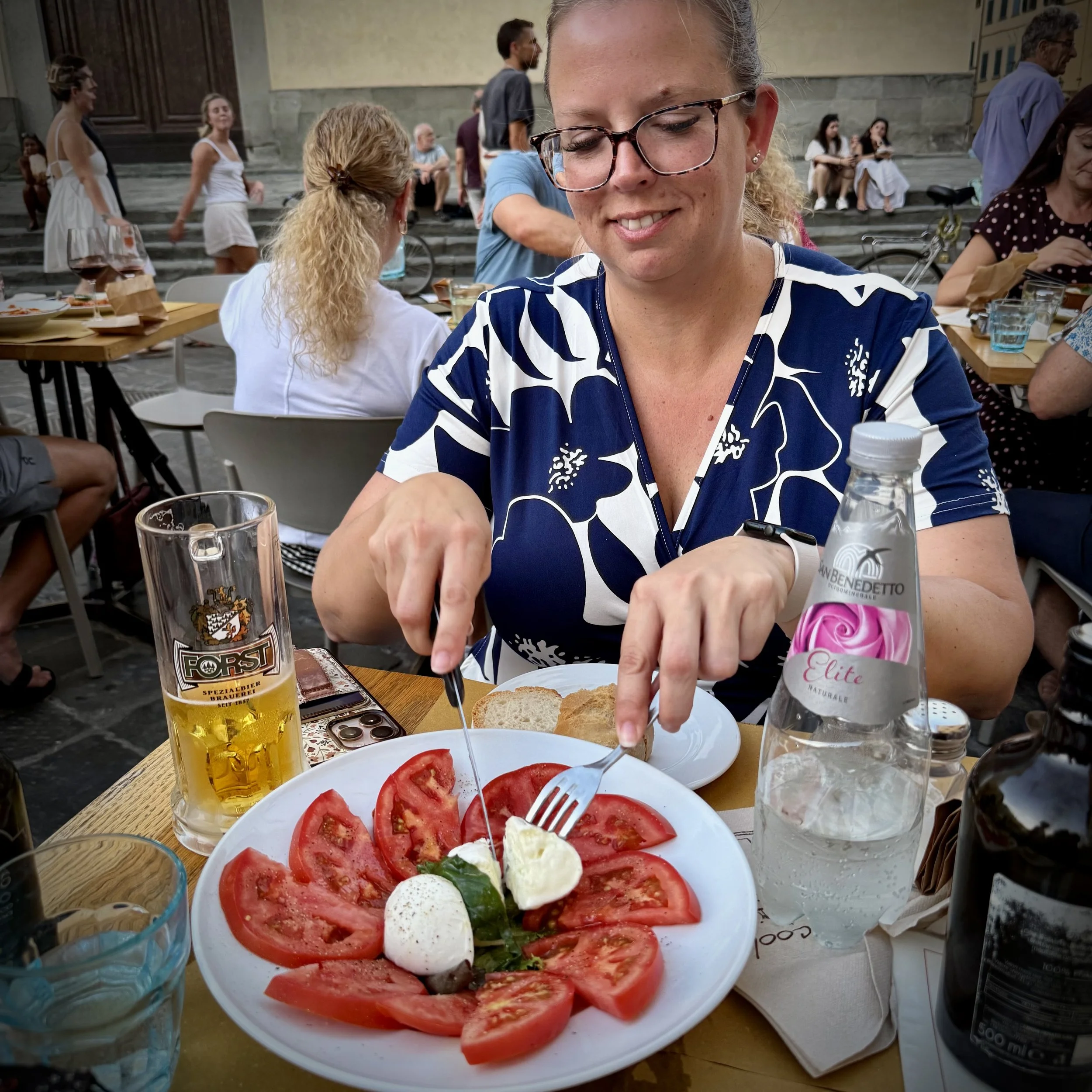 girl eating caprese