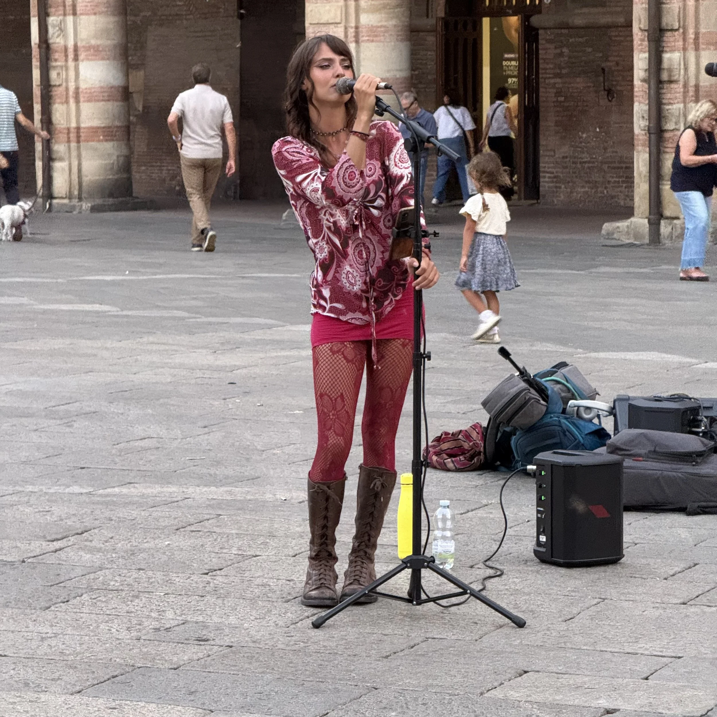 female singer piazza maggiore