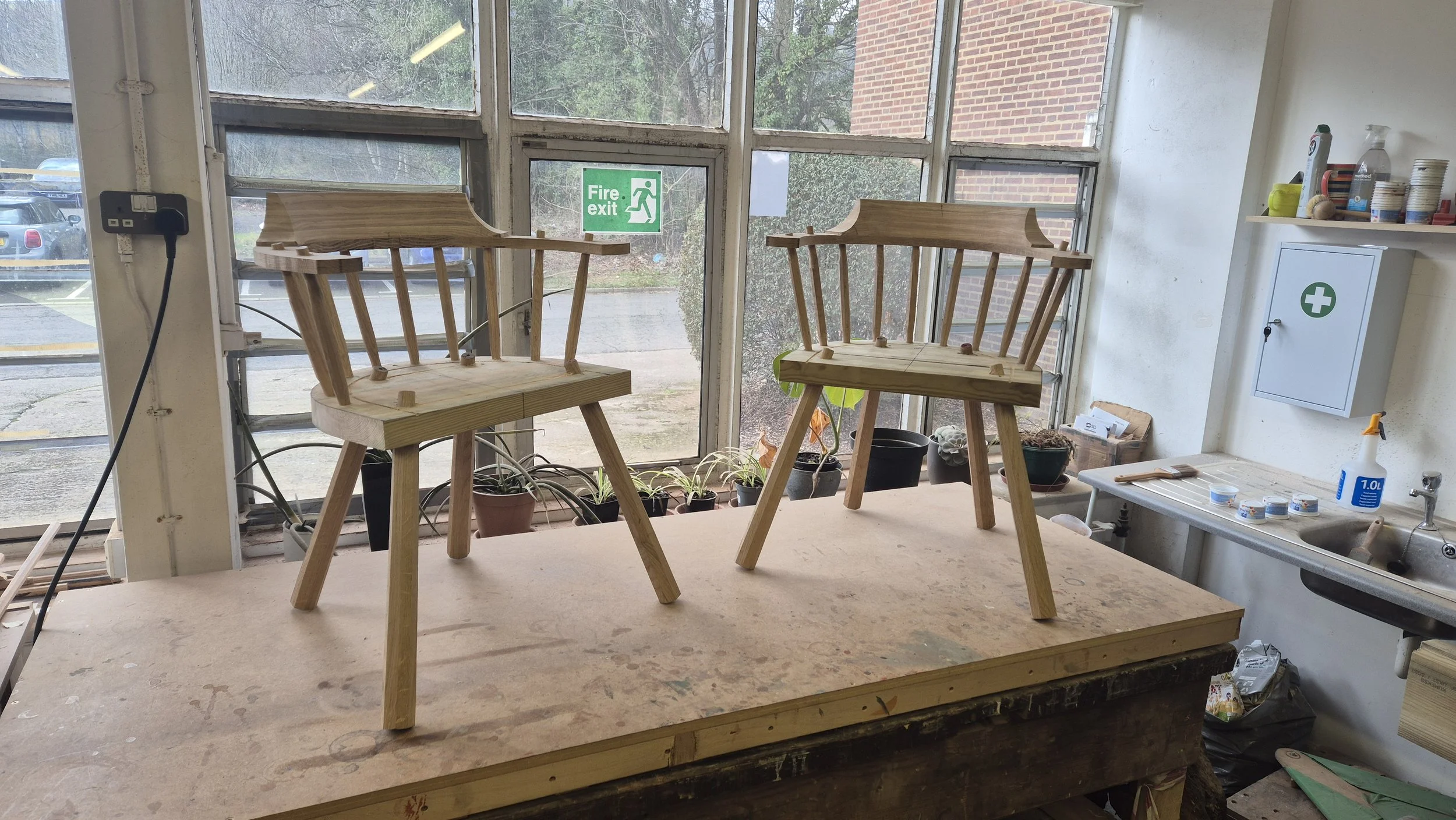 A pair of captain’s chairs