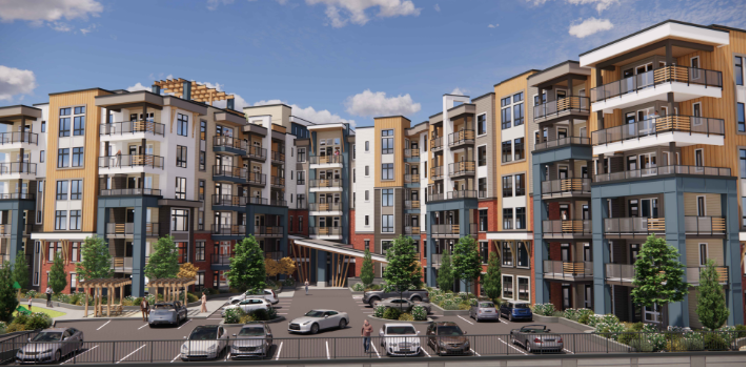 Modern multi-story apartment complex with parking lot and trees in the foreground.