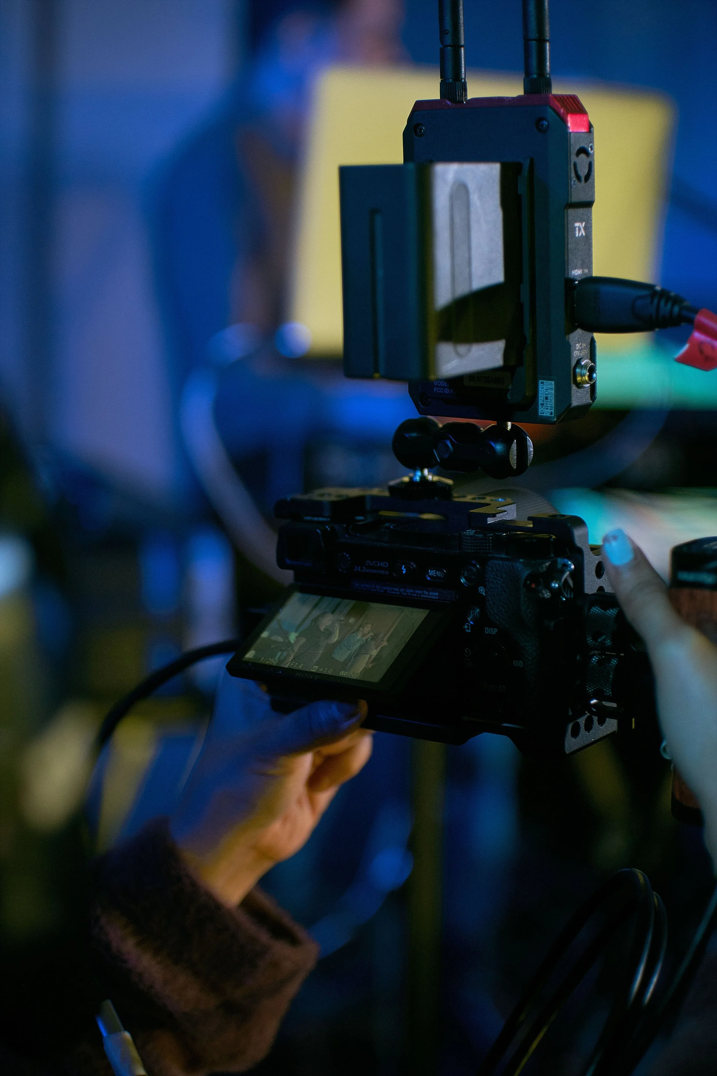 Professional cinema camera with wireless video transmitter during production