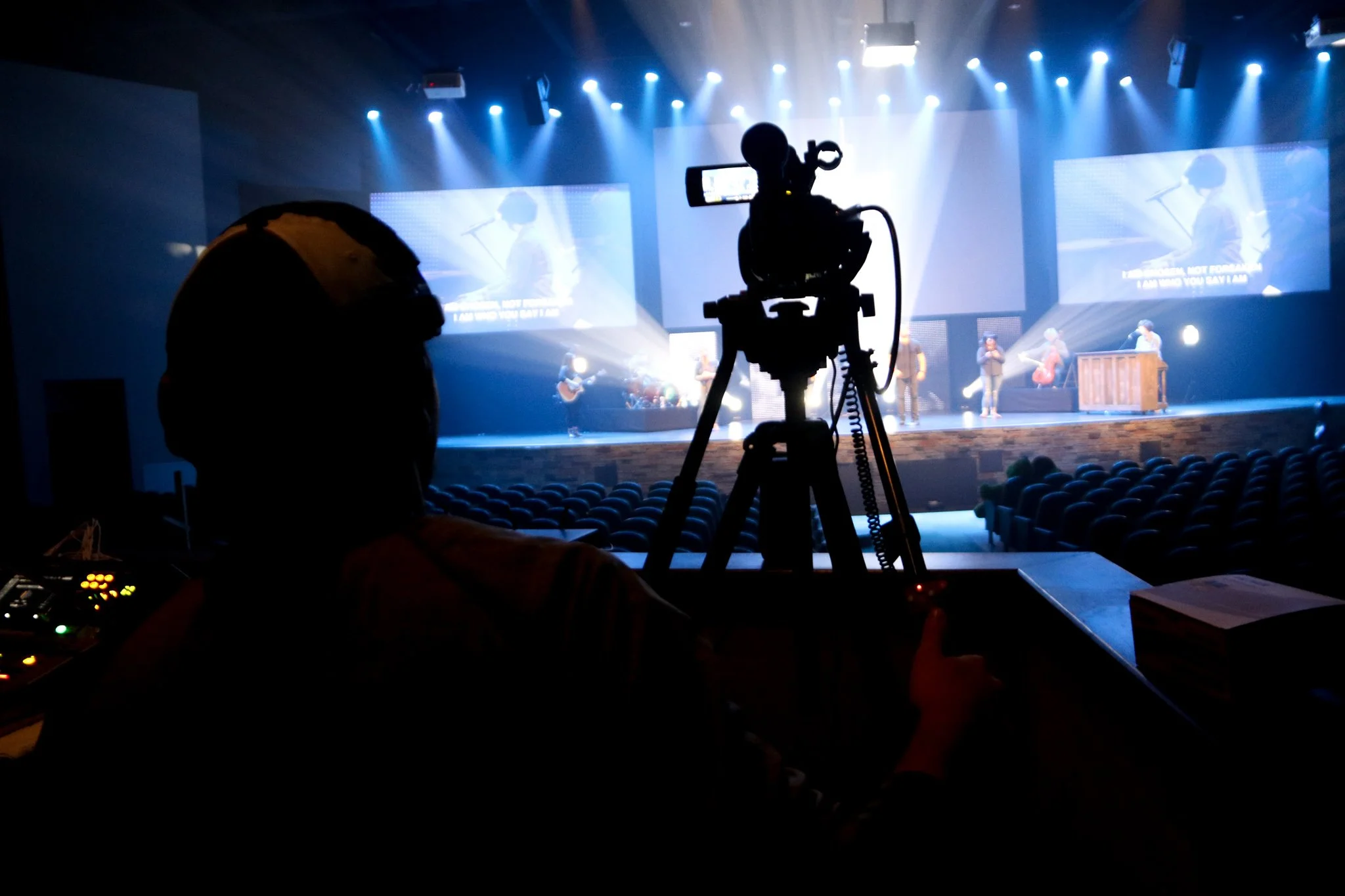 Professional camera filming a live church production
