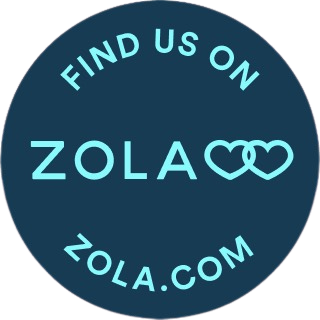 Circular badge with blue background and turquoise text that reads "Find us on Zola" and "Zola.com", with two overlapping hearts next to the Zola logo.
