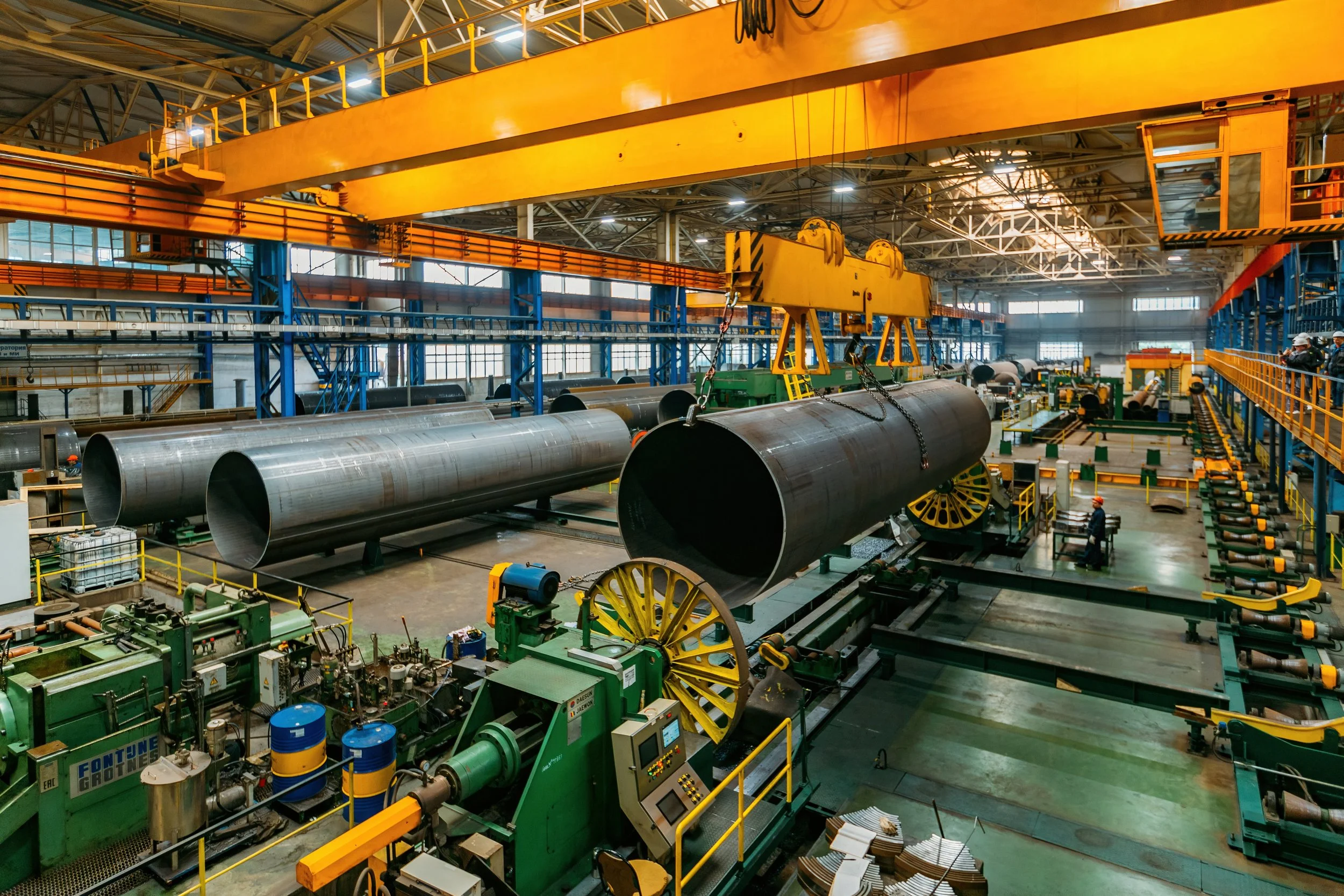 Overhead crane operation in fabrication shop setting