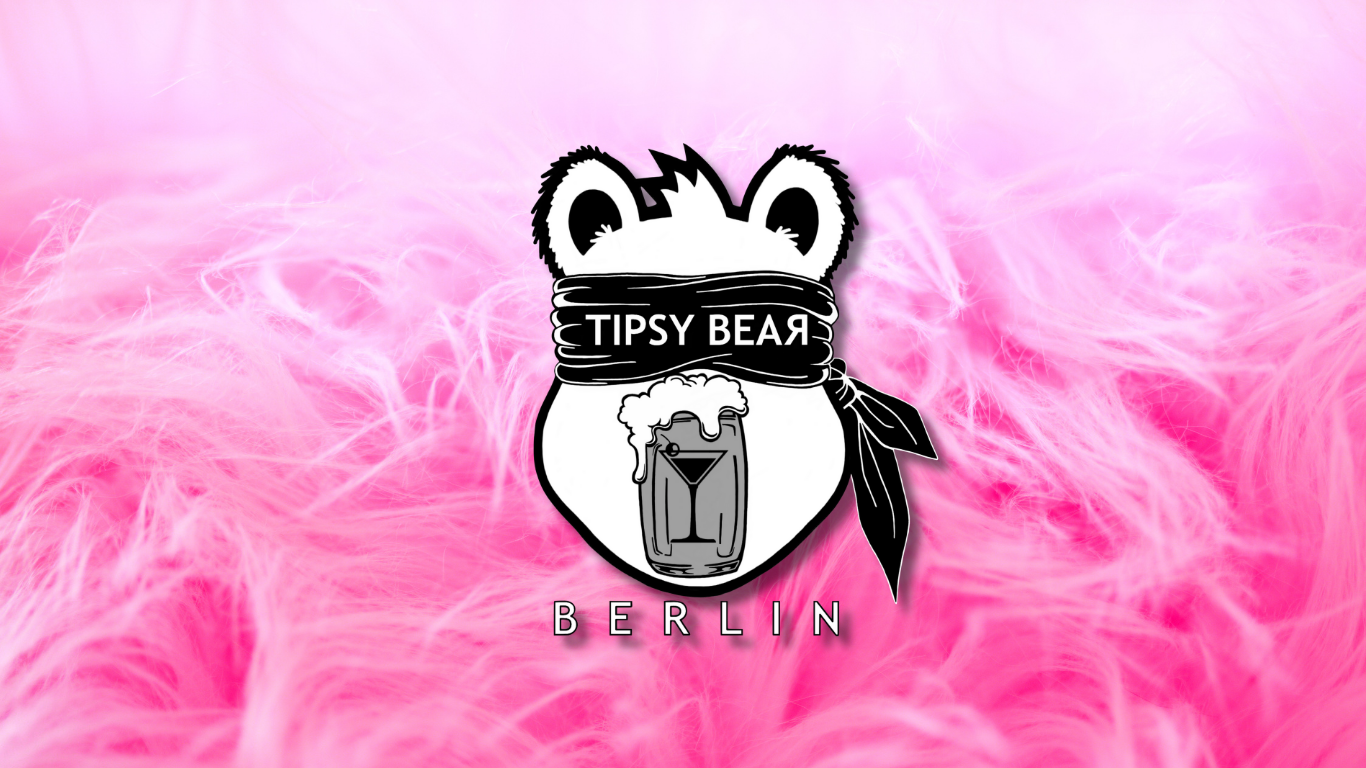 Logo featuring a bear with a scarf covering its eyes, holding a beer mug overflowing with foam, set against a pink, fluffy background. The text 'TIPSY BEAR' is on the scarf, and 'BERLIN' is at the bottom.