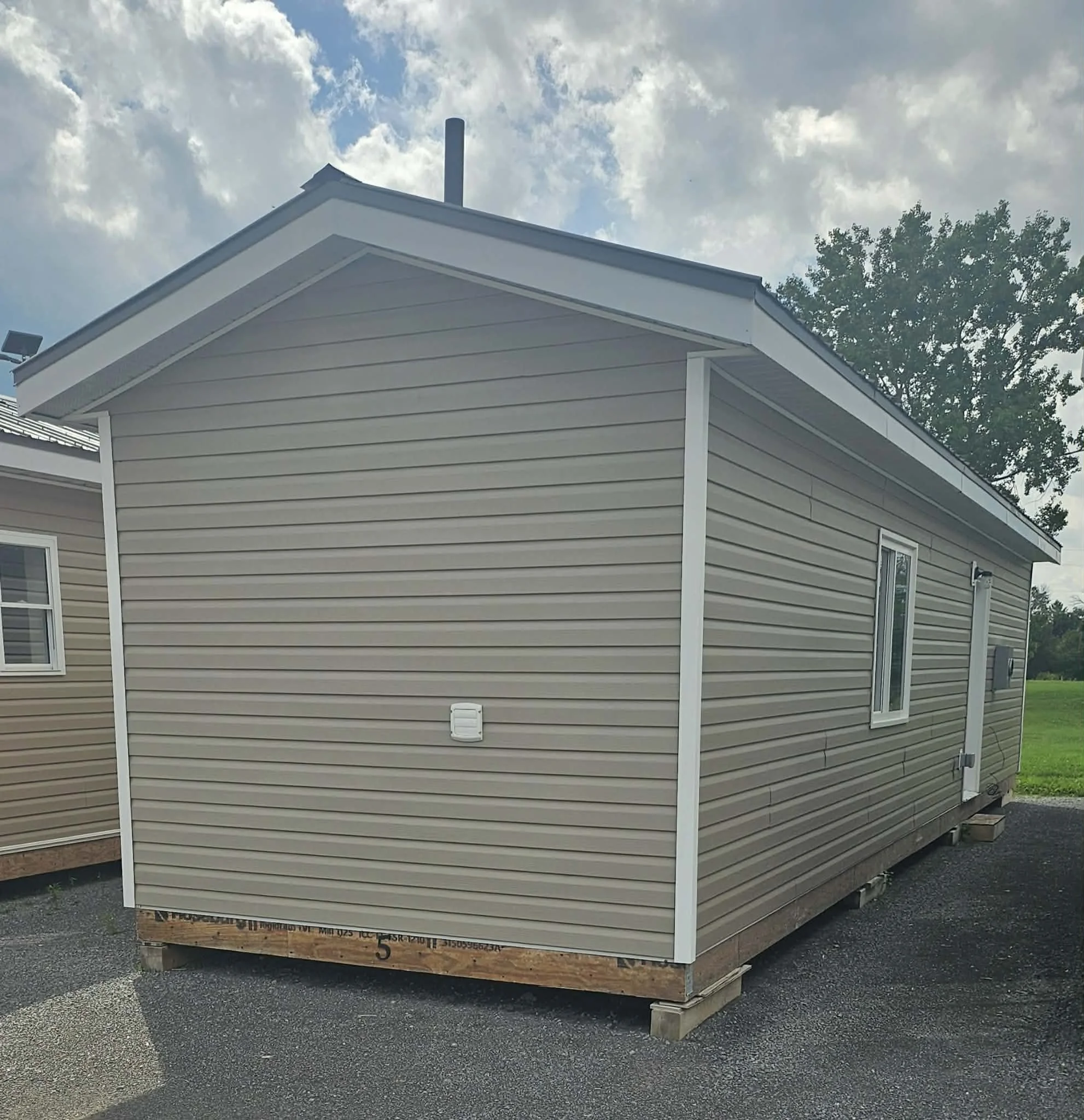 Beige modular house structure under construction