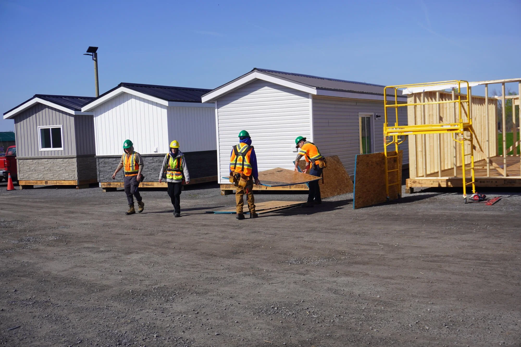 Indigenous trainees building a prefabricated house during an ALFDC construction and skilled trades pre-apprenticeship program.