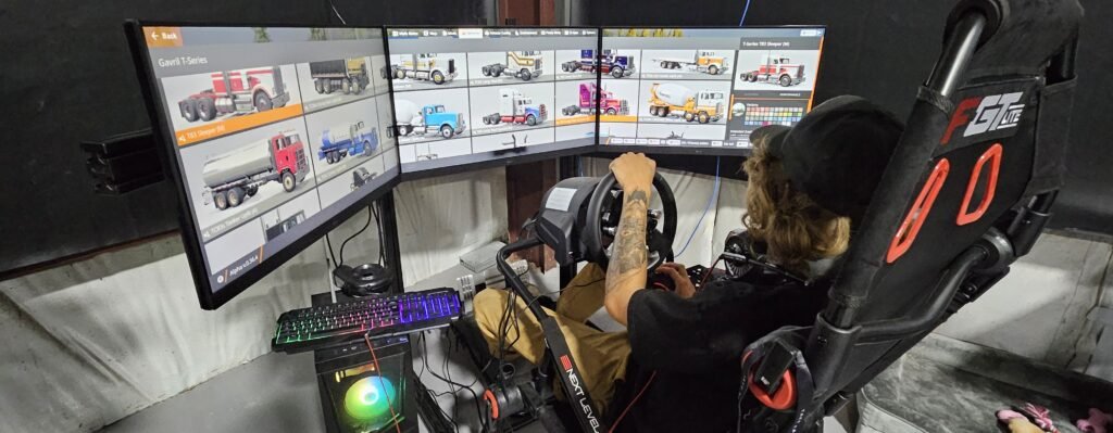 Trainee practicing on a driving simulator console