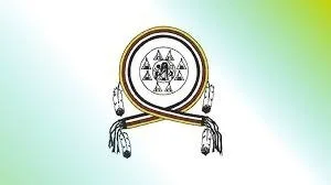 A circular emblem or symbol with a central triangle and various decorative elements, including tassels and a gradient green background.