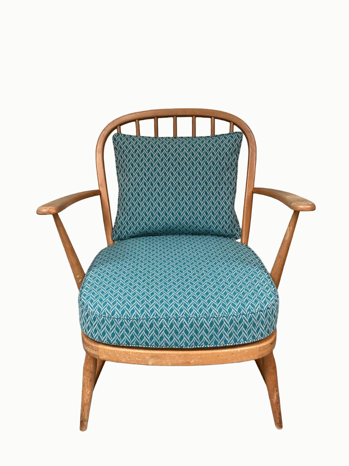 Ercol wooden chair with a teal patterned cushion and matching pillow.