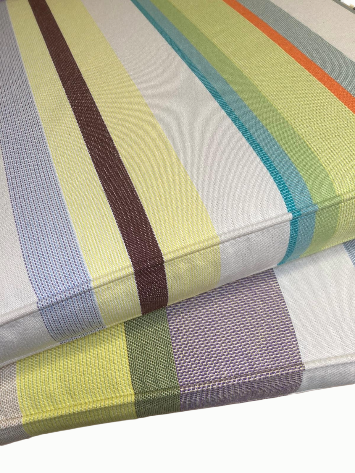 Close-up of a colorful striped fabric-covered cushions.