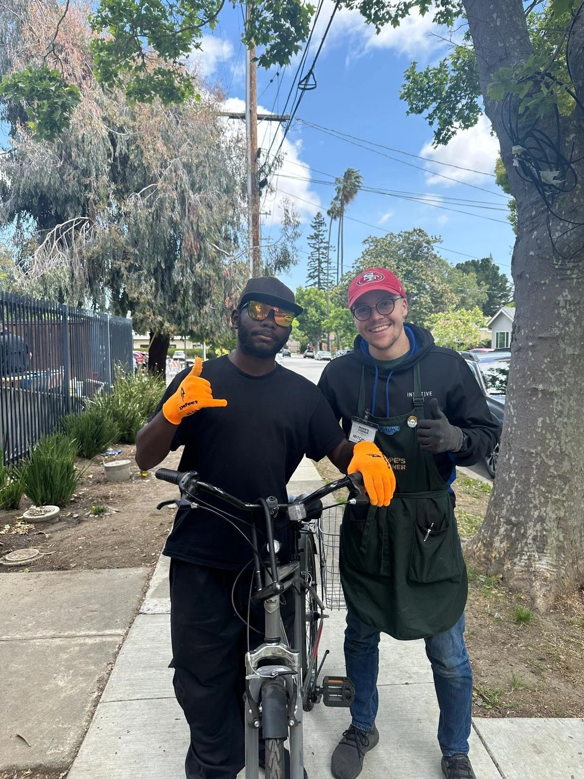 Mitchell and Nate with bike.jpeg