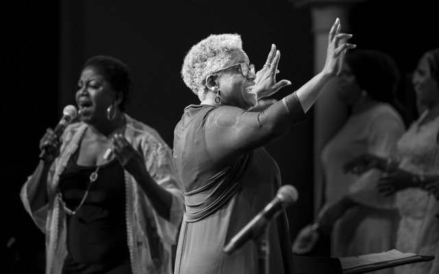 Karen Burke, artistic director of the Toronto Mass Choir and professor at York University leading a gospel choir masterclass