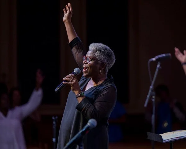 Karen Burke leading a gospel music workshop for Canadian educators and singers.