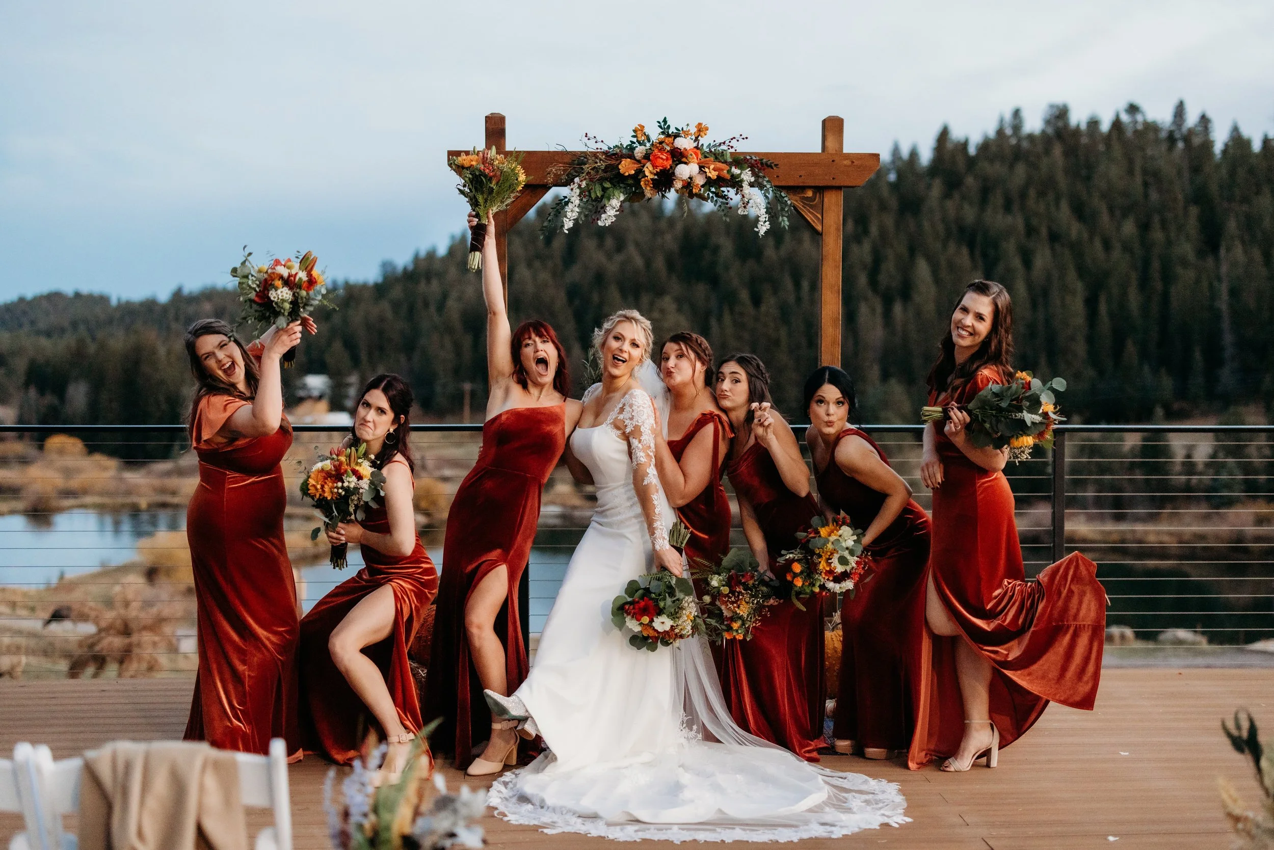 Bride celebrating with bridesmaids at Mountain View Ranch.