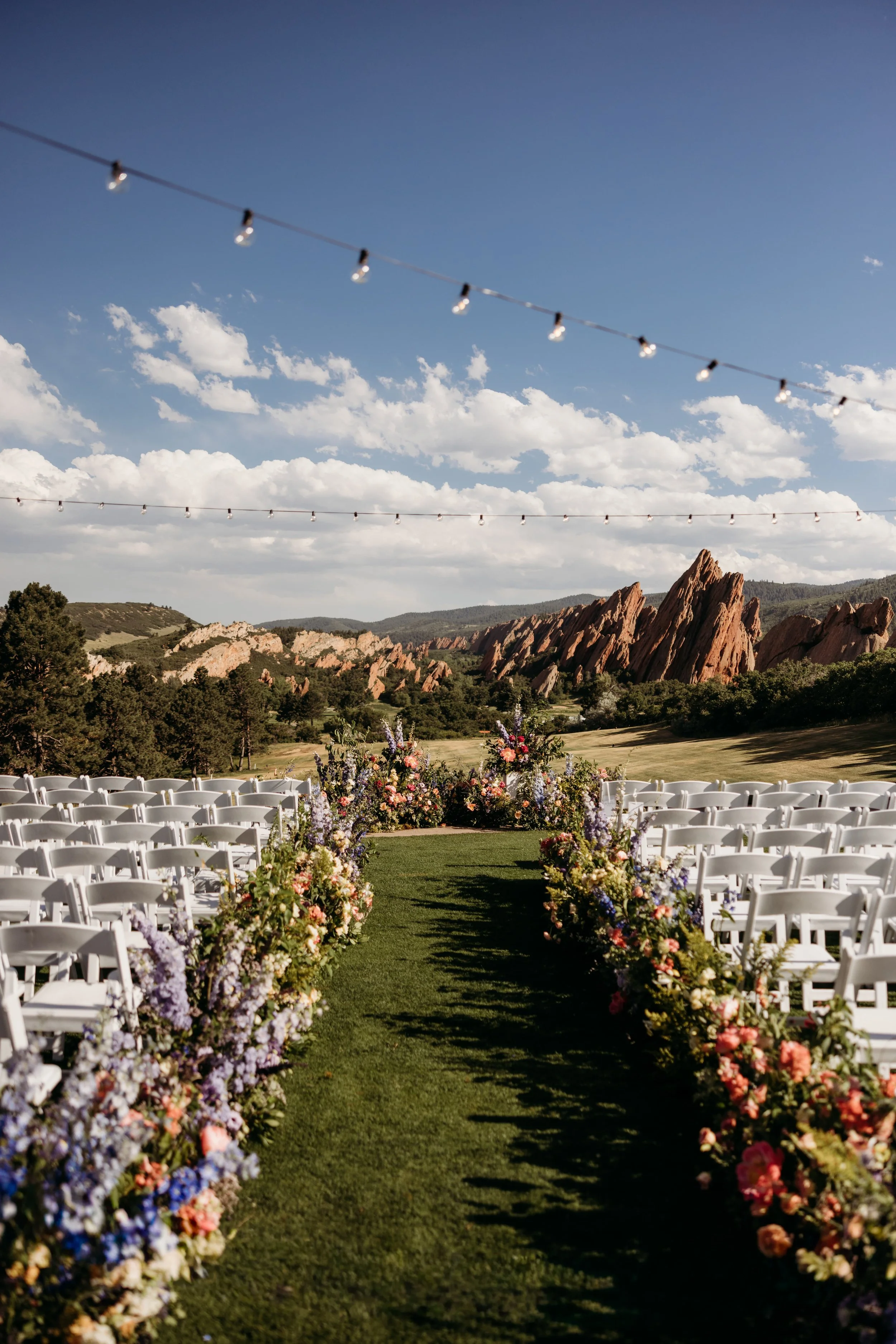 Wedding ceremony setup at Arrowhead Golf Course in Littleton, Colorado.