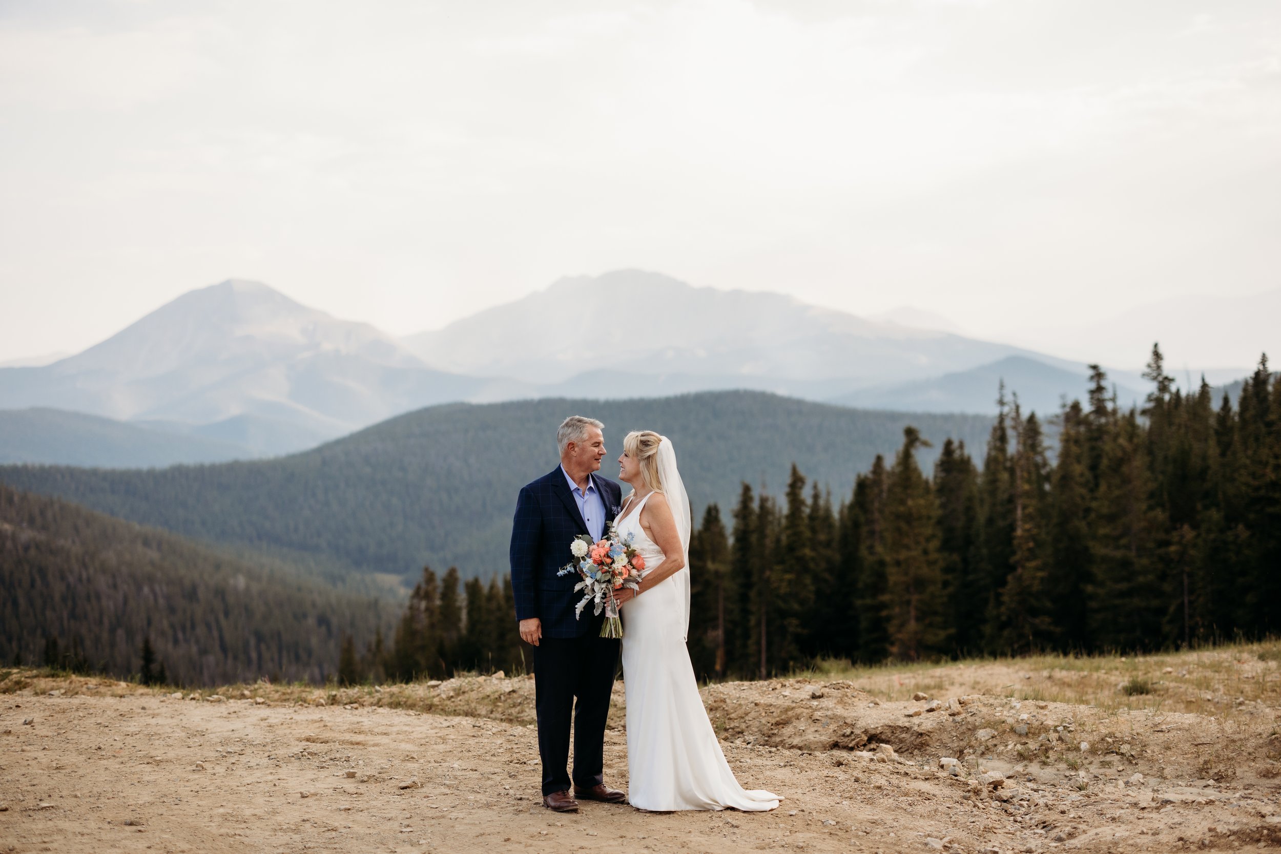 Bride and groom gazing at each other at their wedding at the Keystone Lodge.