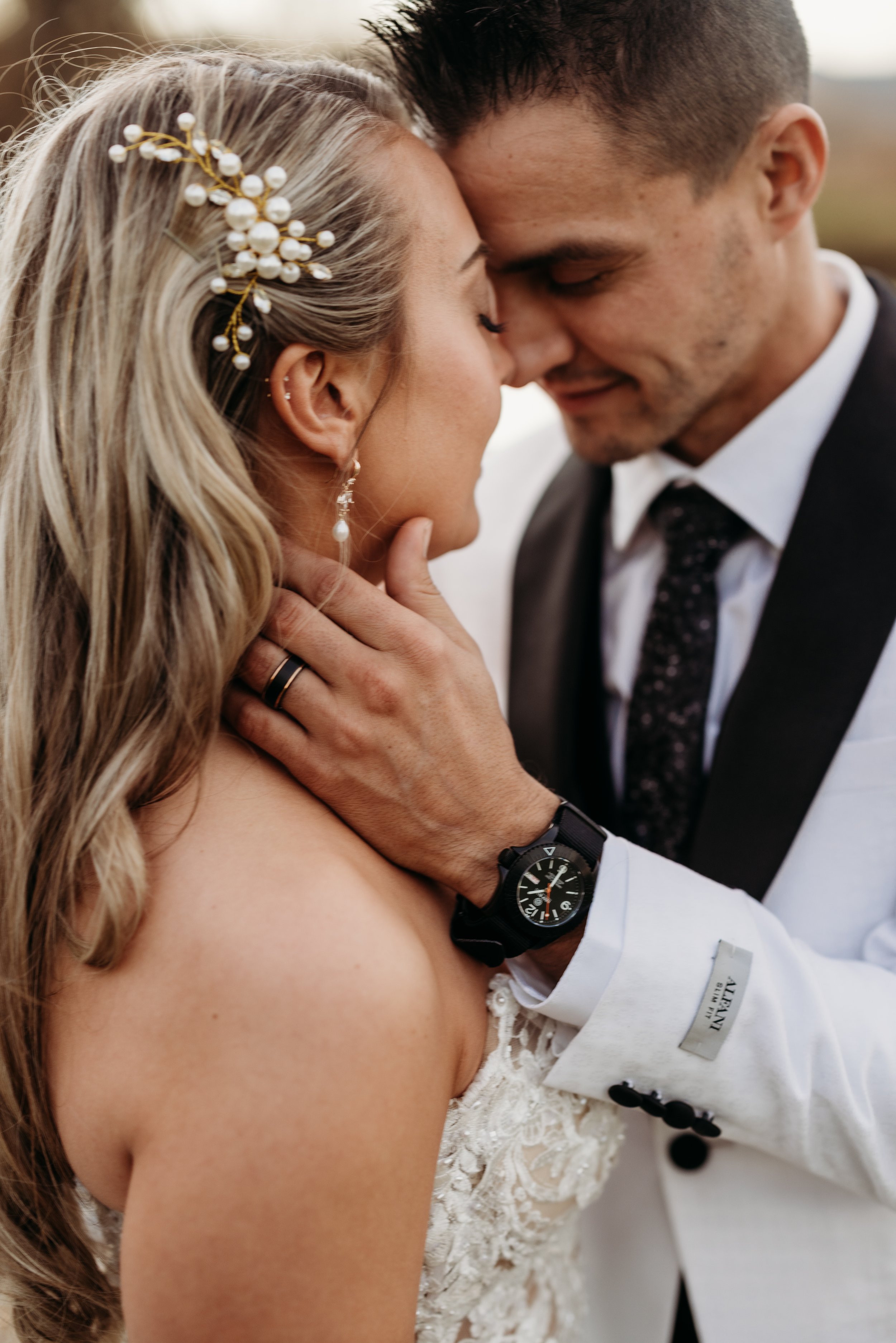 Bride and groom sharing a quiet moment together.