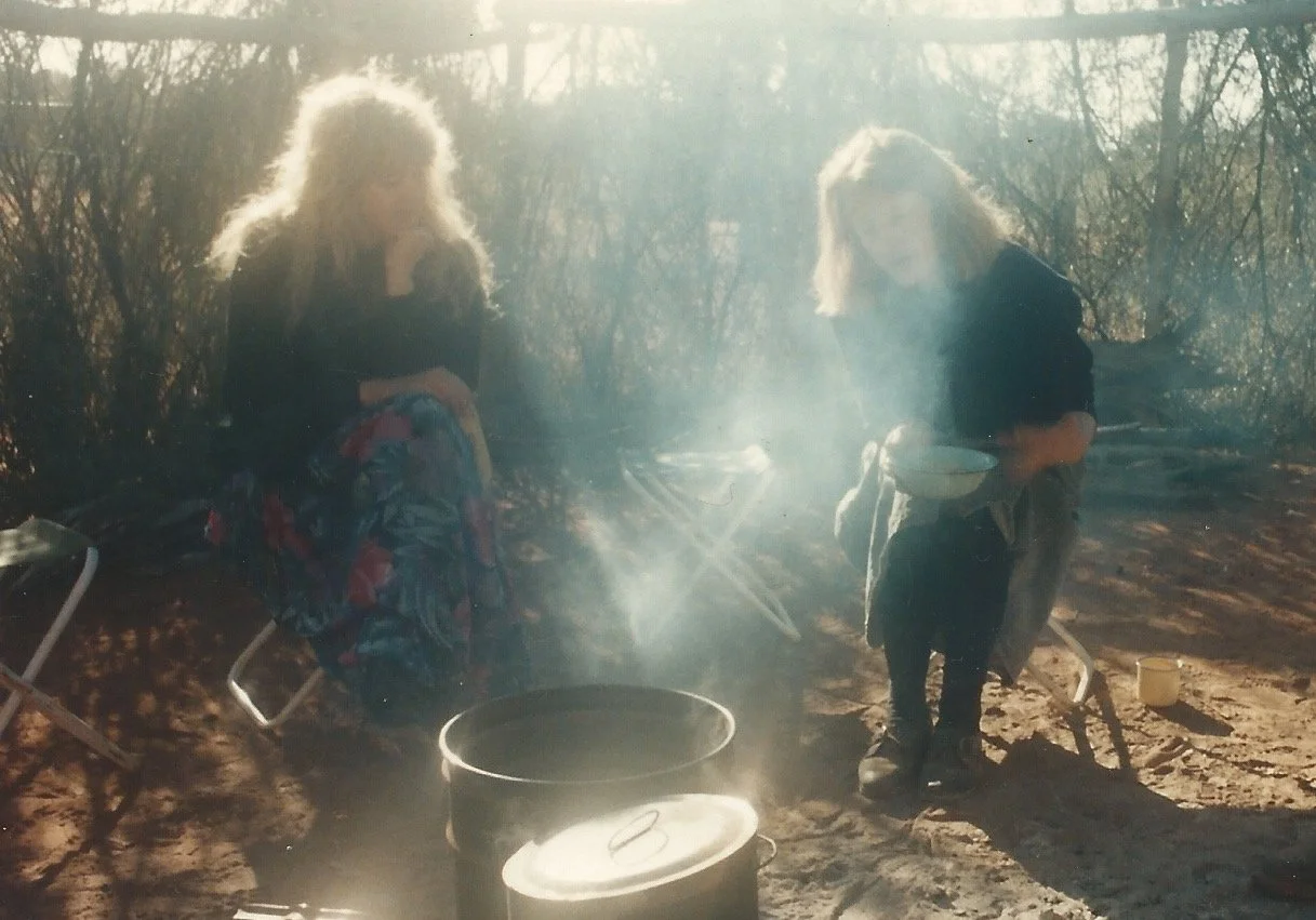 Sitting in the desert while filming "Women of the Earth." A documentary about Australian Aboriginal Elders.