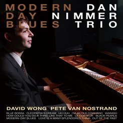 Album cover of Modern-Day Blues by the Dan Nimmer Trio, featuring pianist Dan Nimmer seated at a grand piano.