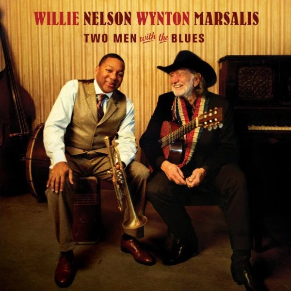 Album cover of Two Men with the Blues by Willie Nelson and Wynton Marsalis, featuring Willie Nelson and Wynton Marsalis seated together with a guitar and trumpet.