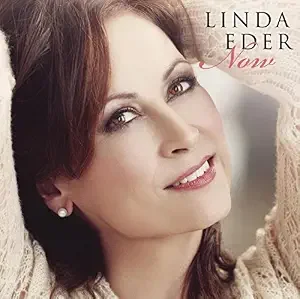 Album cover of Now by Linda Eder, featuring a close-up portrait of Linda Eder smiling.