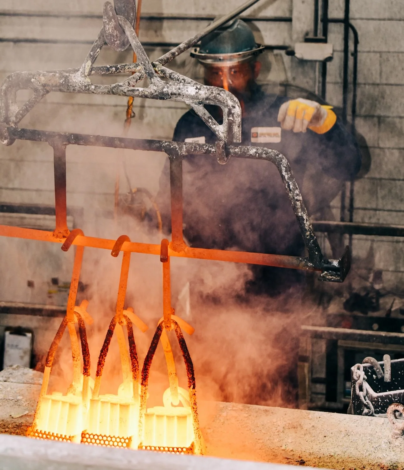 Hot metal undergoing thermal processing at Centurion Metalworks