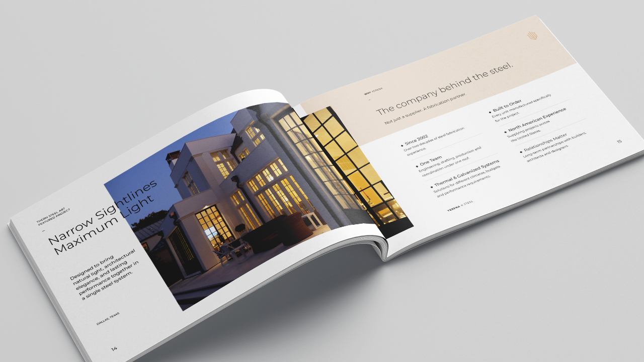 Open brochure displaying an elegant architecturally designed building at dusk, with warm interior lighting visible through large windows.
