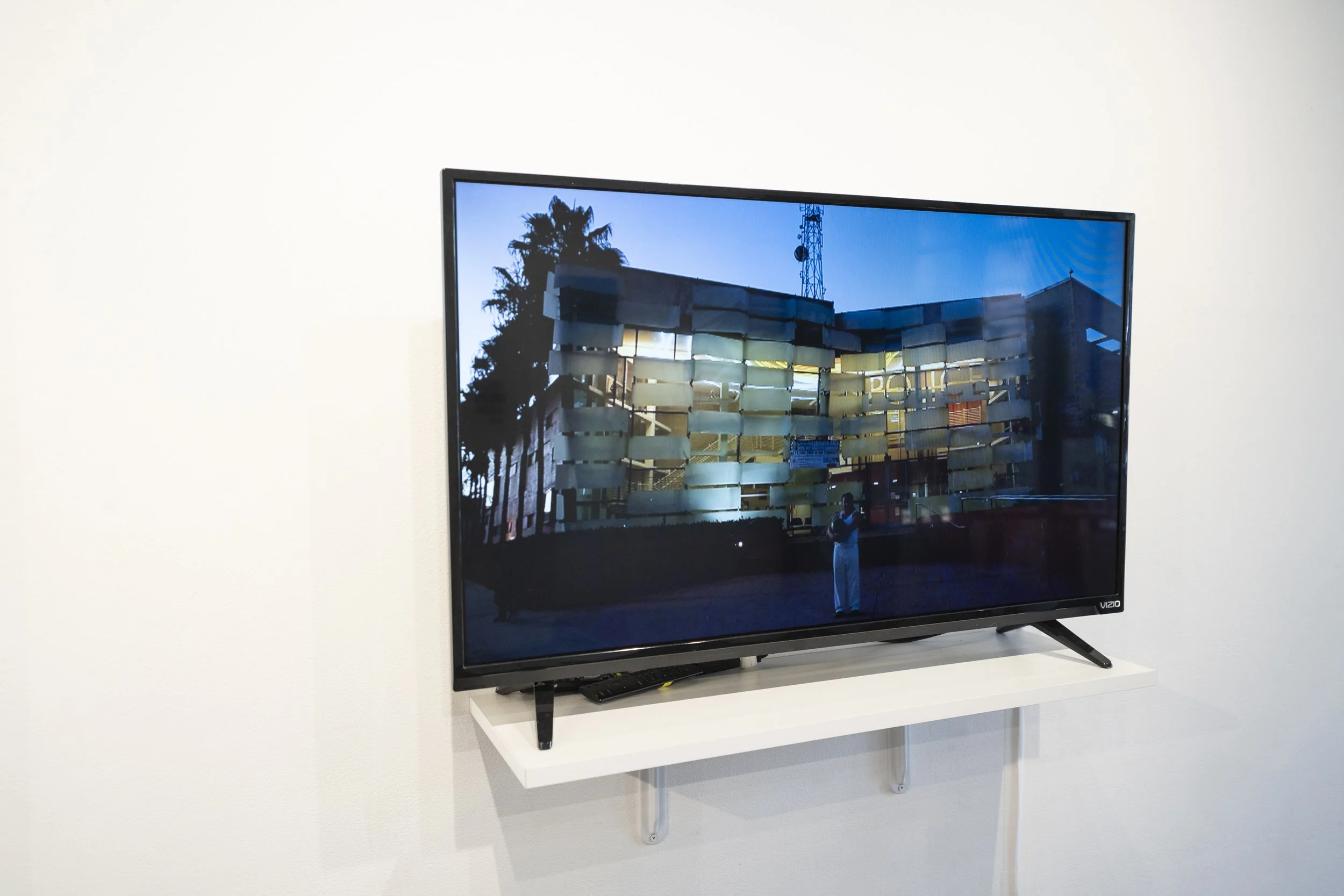  Video Installation in  ASCO: A Study Call to Response - Acts of Protest from L.A. to Chicago , at Pilsen Arts and Community House, Chicago, IL.   Photo credit Kyle Flubacker 
