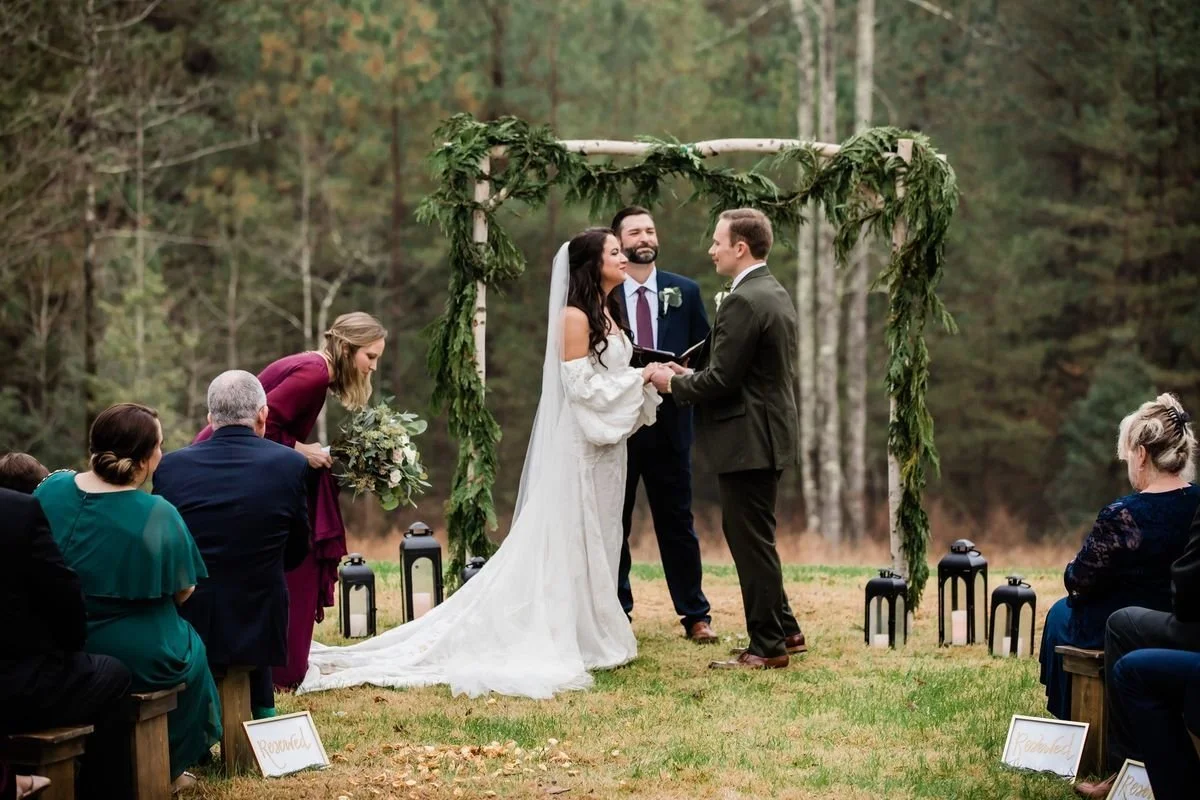 Wedding Ceremony Under the Arch of the Infinity Garden