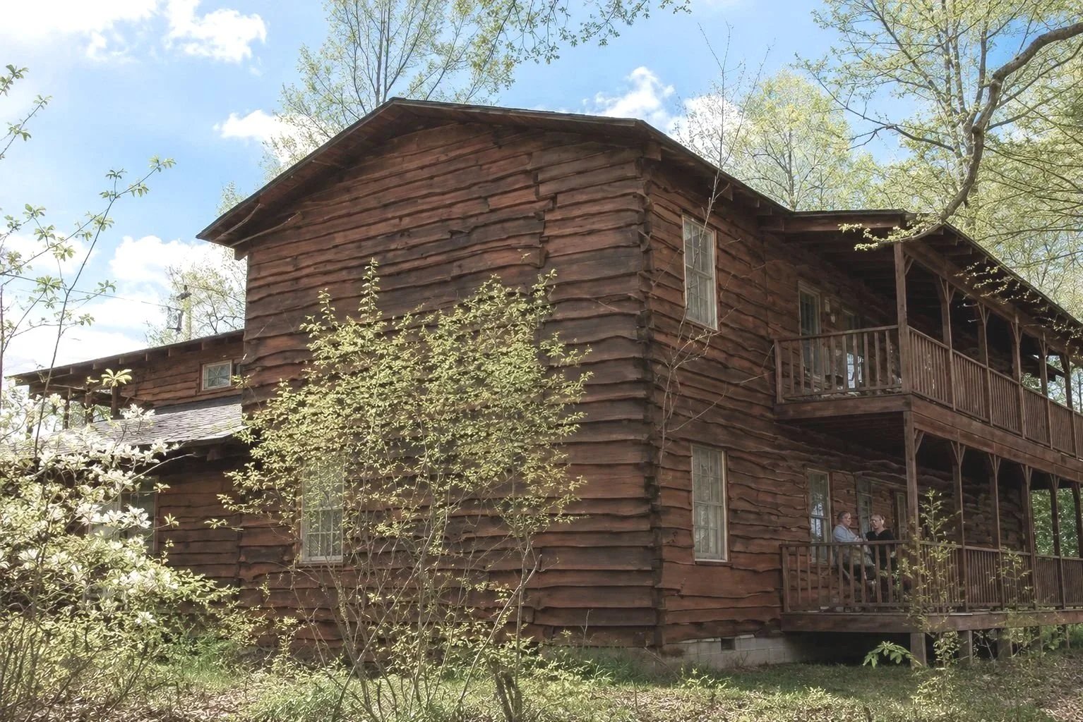 Eagles Nest Lodge - 4 Two Bedroom Suites & 4 Hotel Style Rooms - Sleeps Up to 38 - Combines suites and hotel-style accommodations with a full kitchen and hospitality room with gas fireplace.