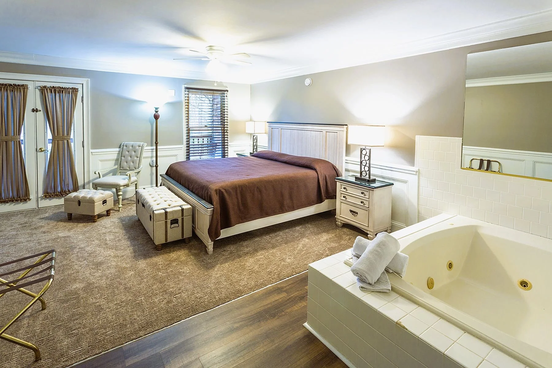 Newly remodeled adult-only King Junior Suite featuring custom mood lighting and an electric fireplace.